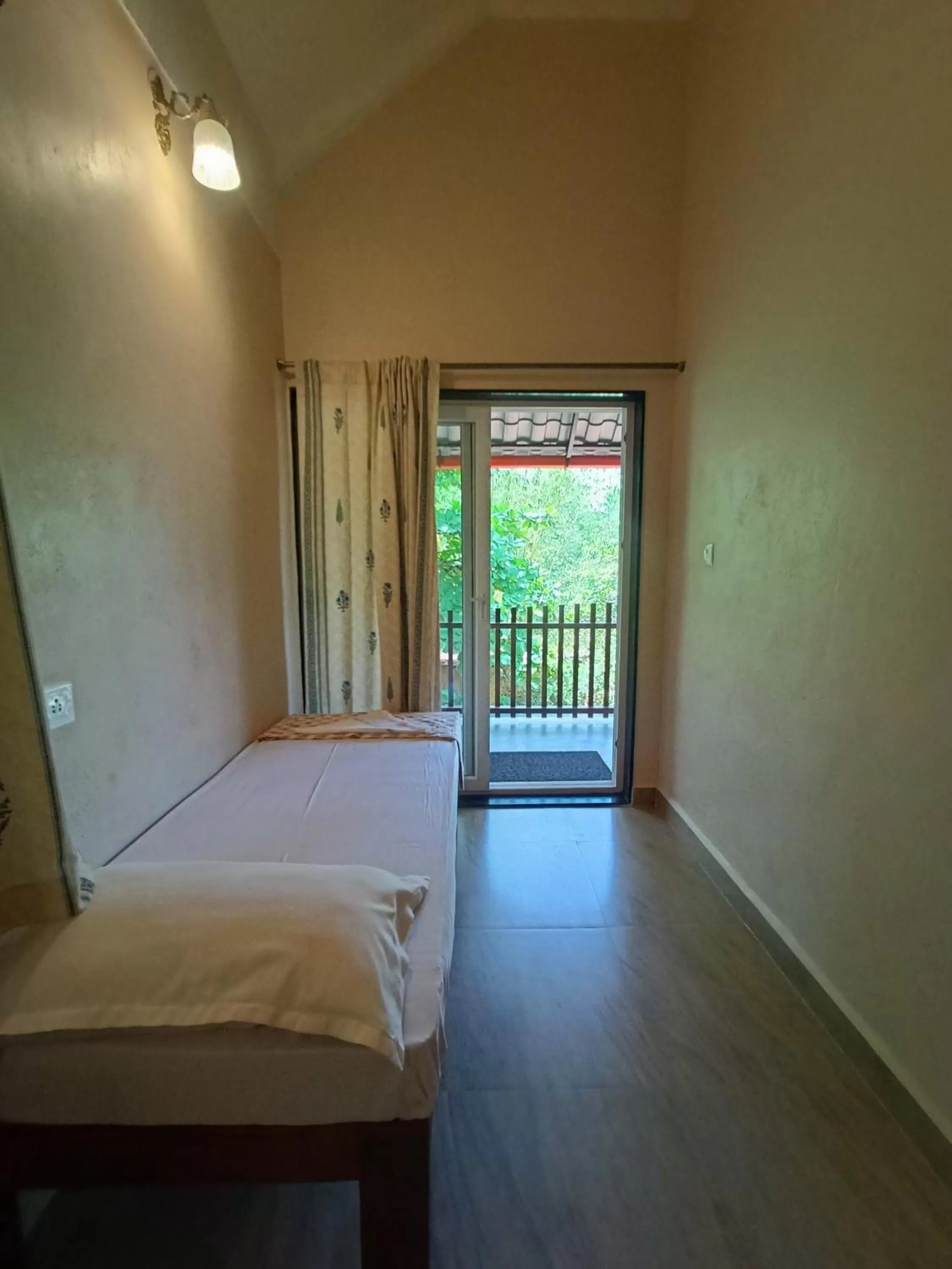 Bed in OmBodhi Retreat