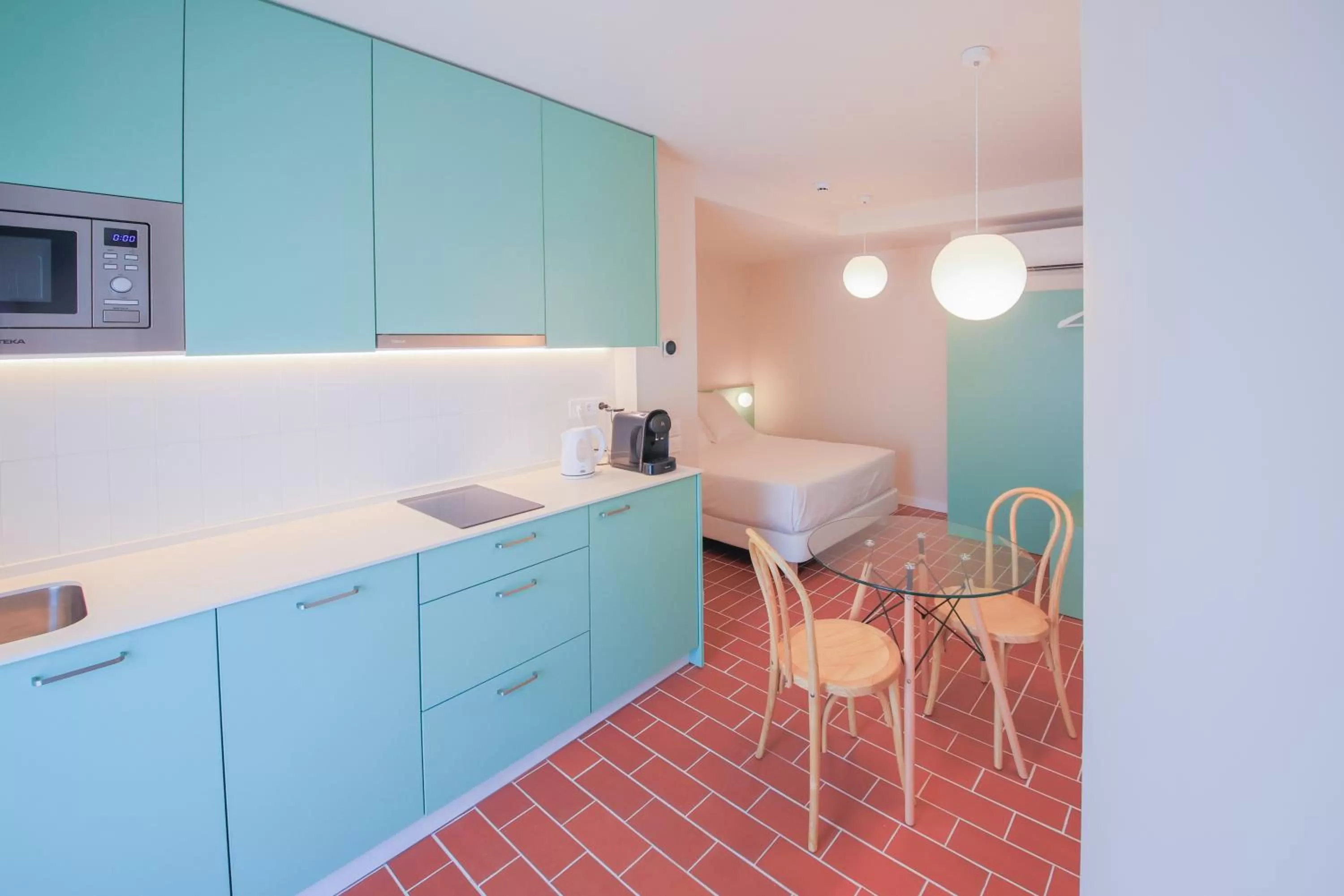 Bed, Kitchen/Kitchenette in Terra Aurea Aparthotel