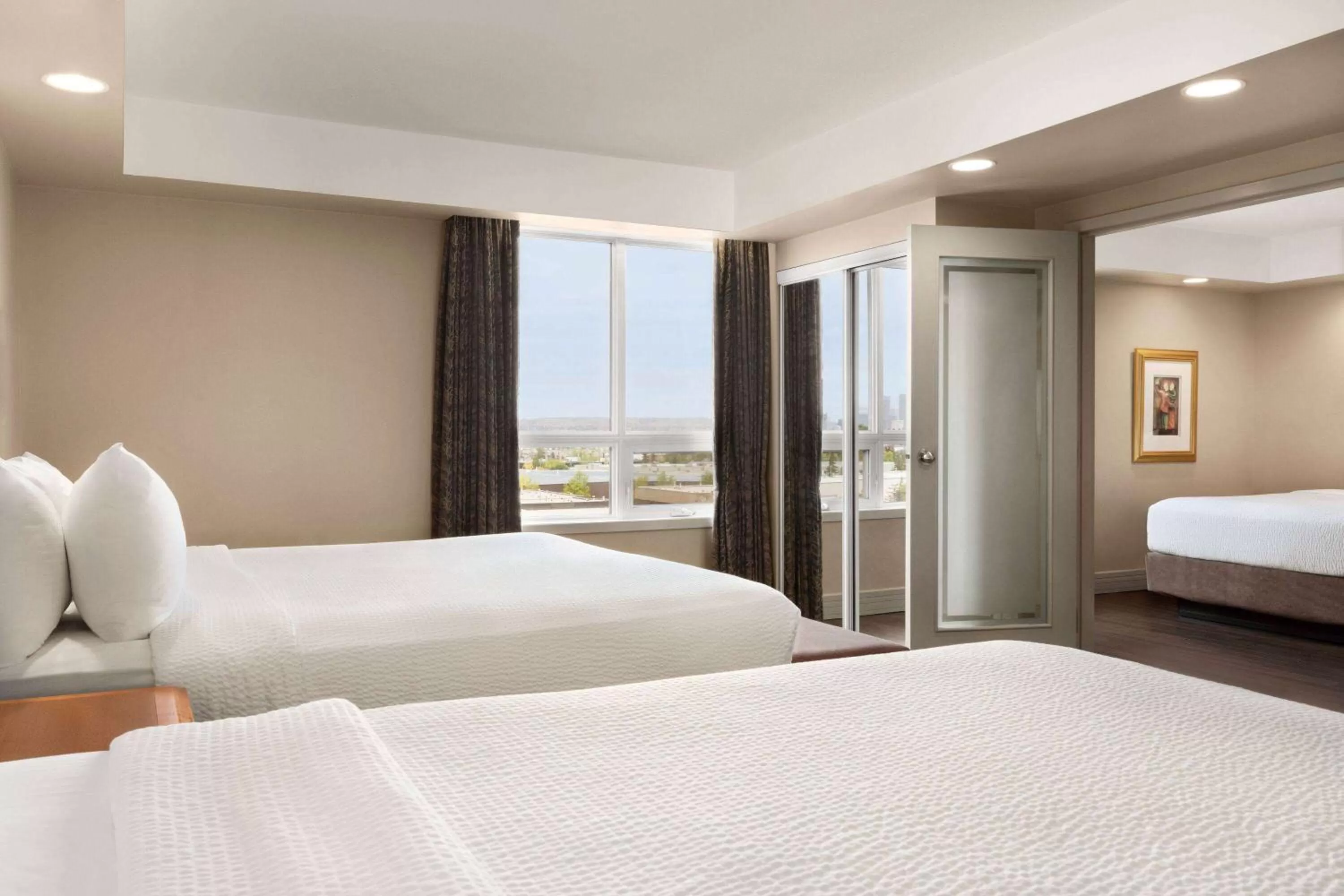 Bed in Royal Hotel Calgary, Trademark Collection by Wyndham