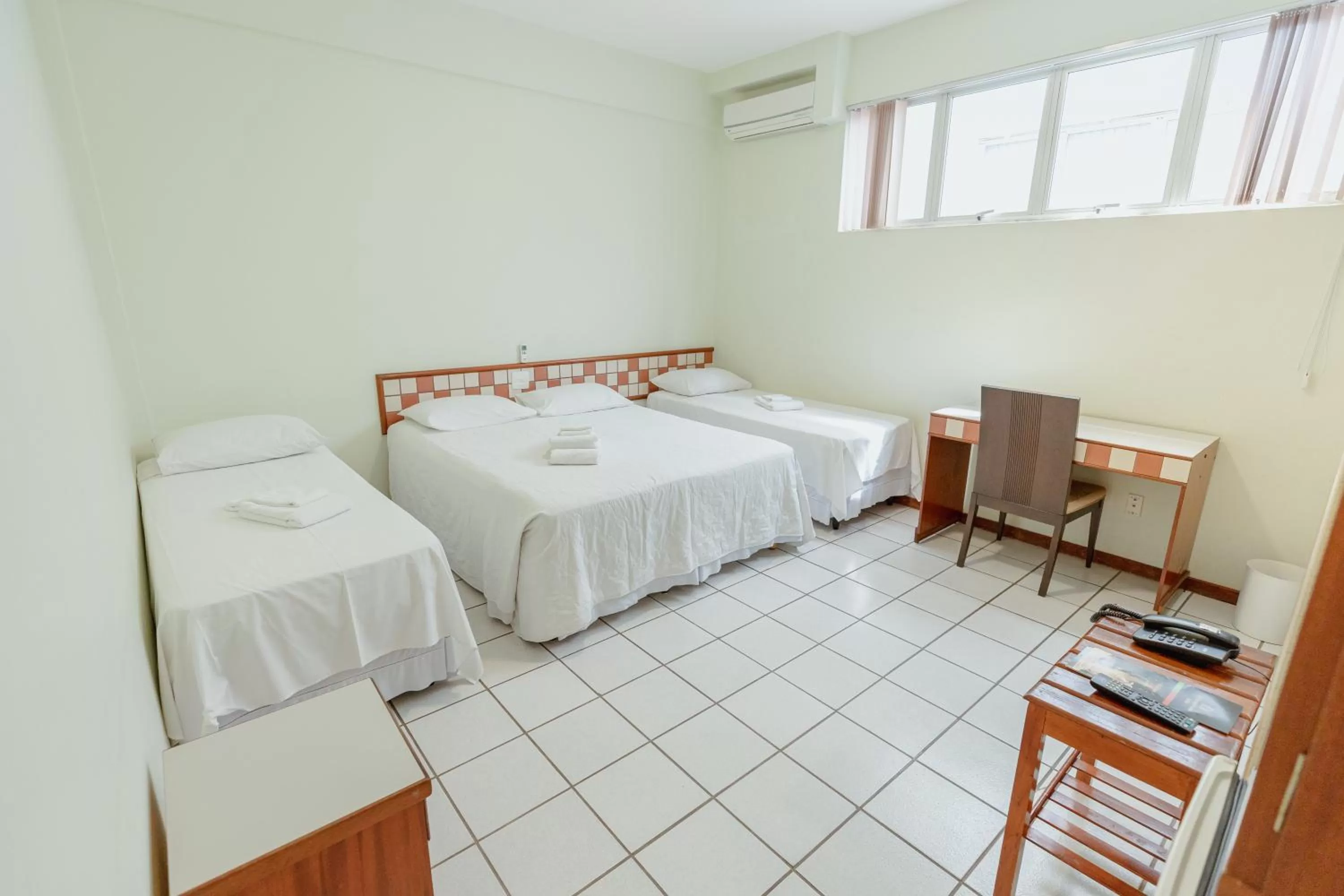 Bed in Hotel Metropolitano