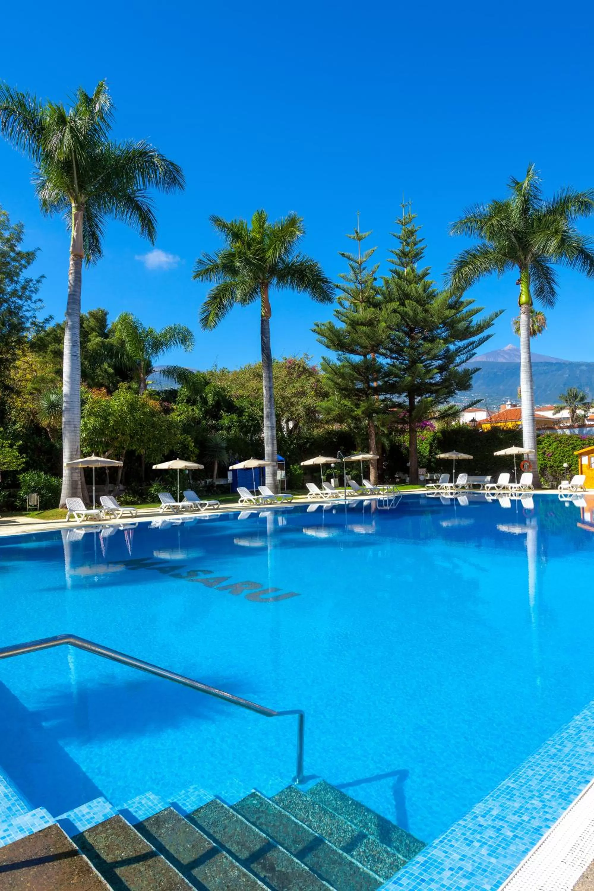 Swimming pool in Apartamentos Masaru