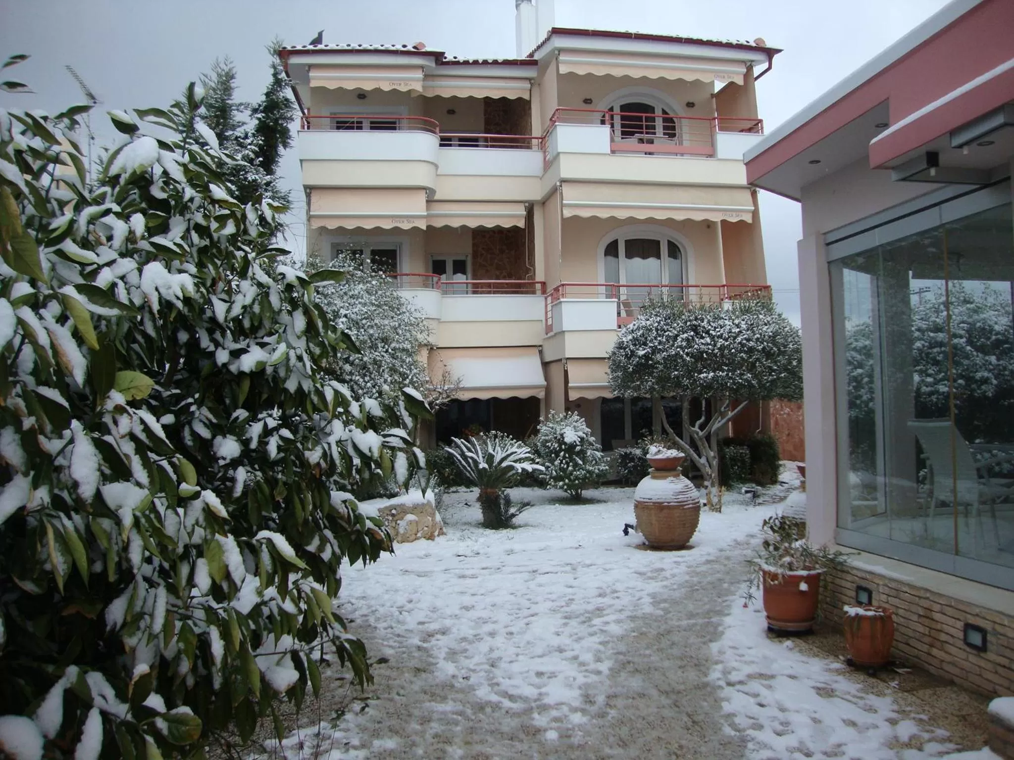 Property Building in Over Sea Rooms & Villas