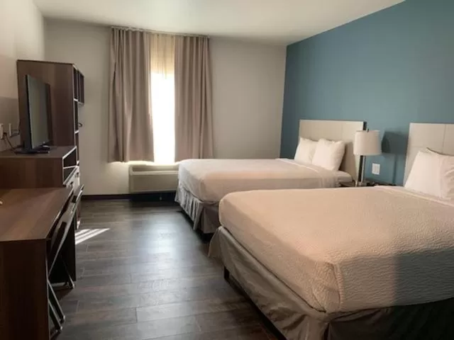 Bed in Candlewood Suites Pecos by IHG