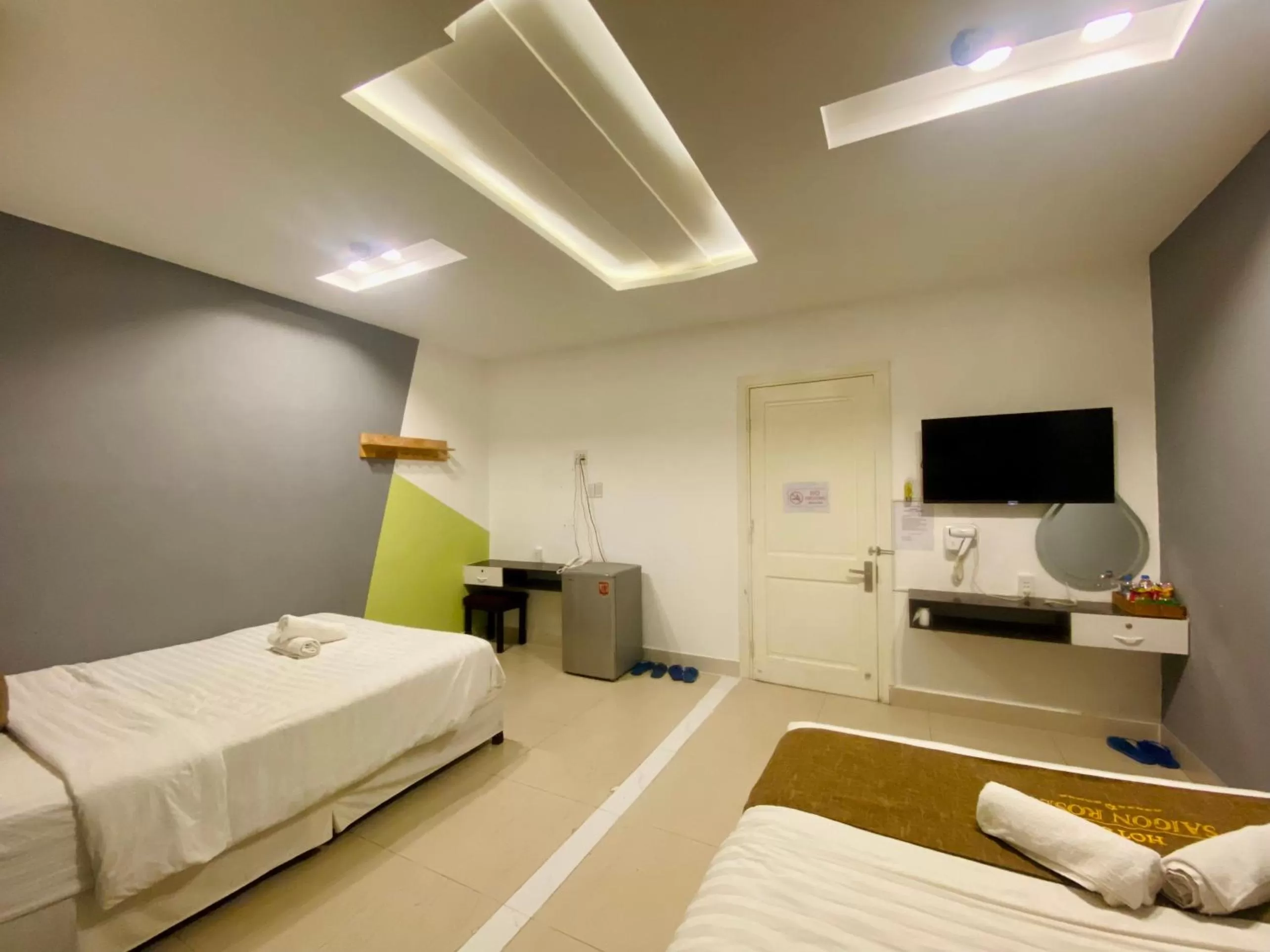 Photo of the whole room, Bed in SaiGon Rose Hotel