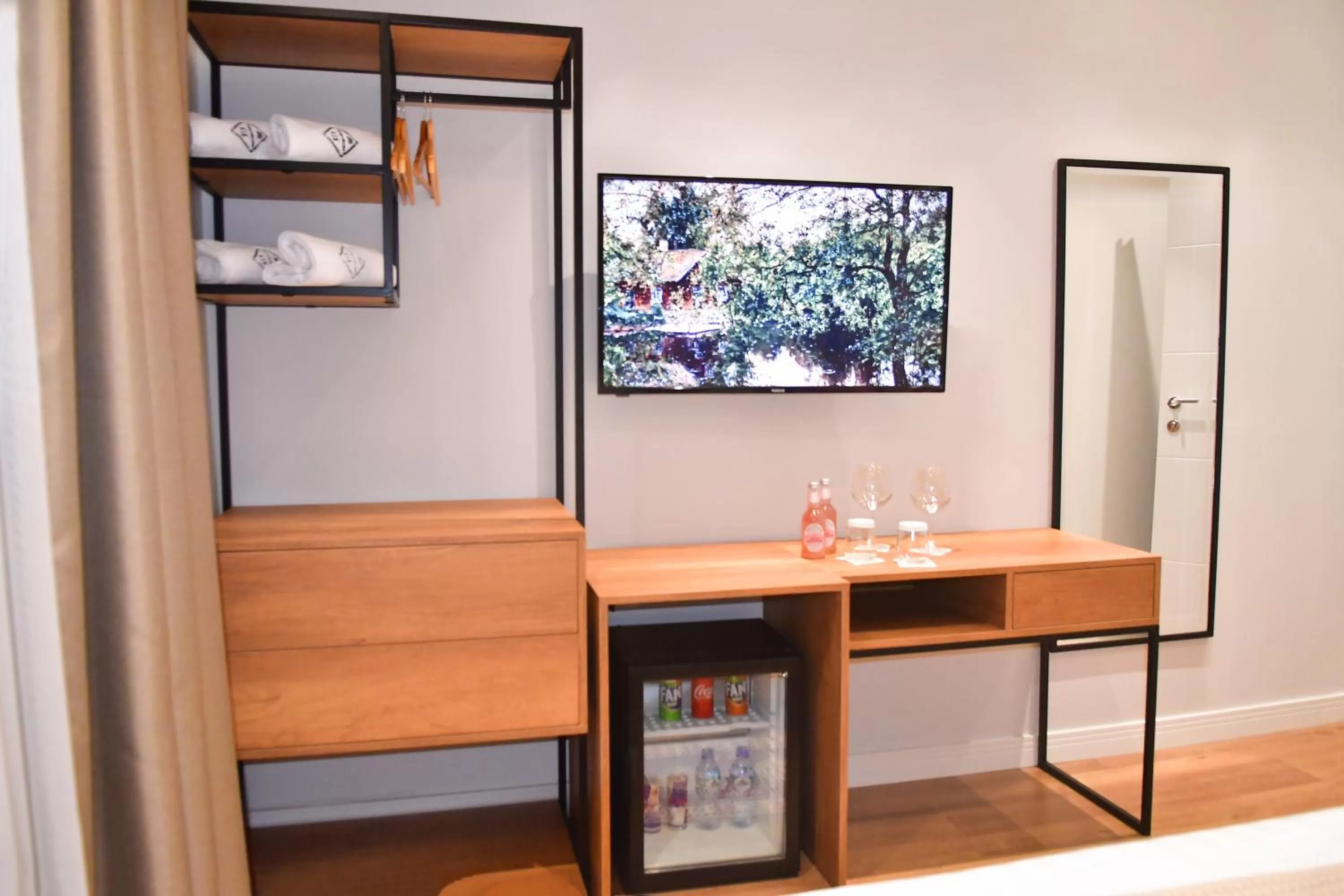 Staff, TV/Entertainment Center in 313 Villa City Center Hotel