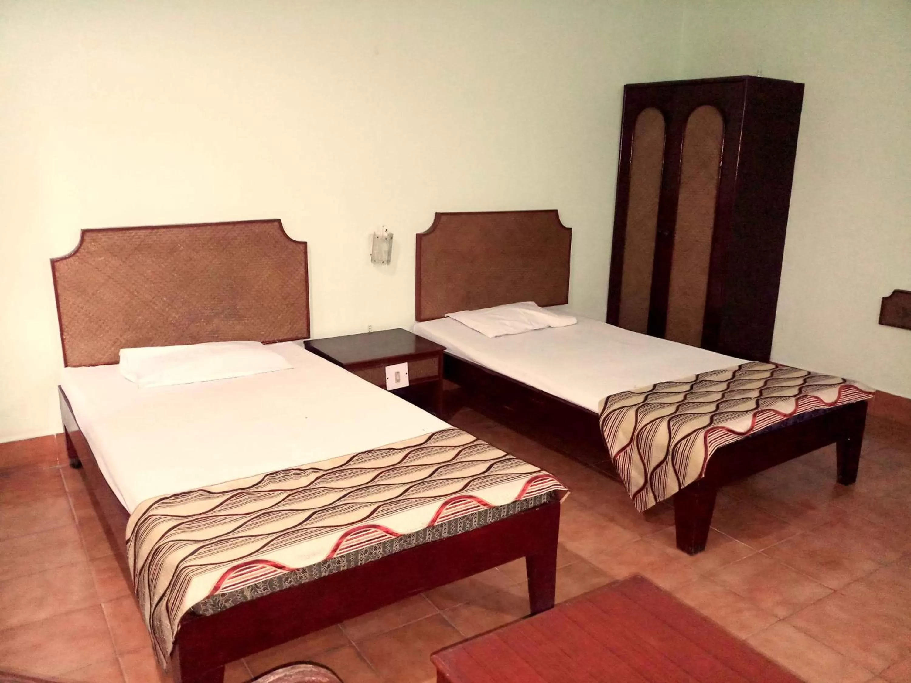 Bed in Hotel Indsurya