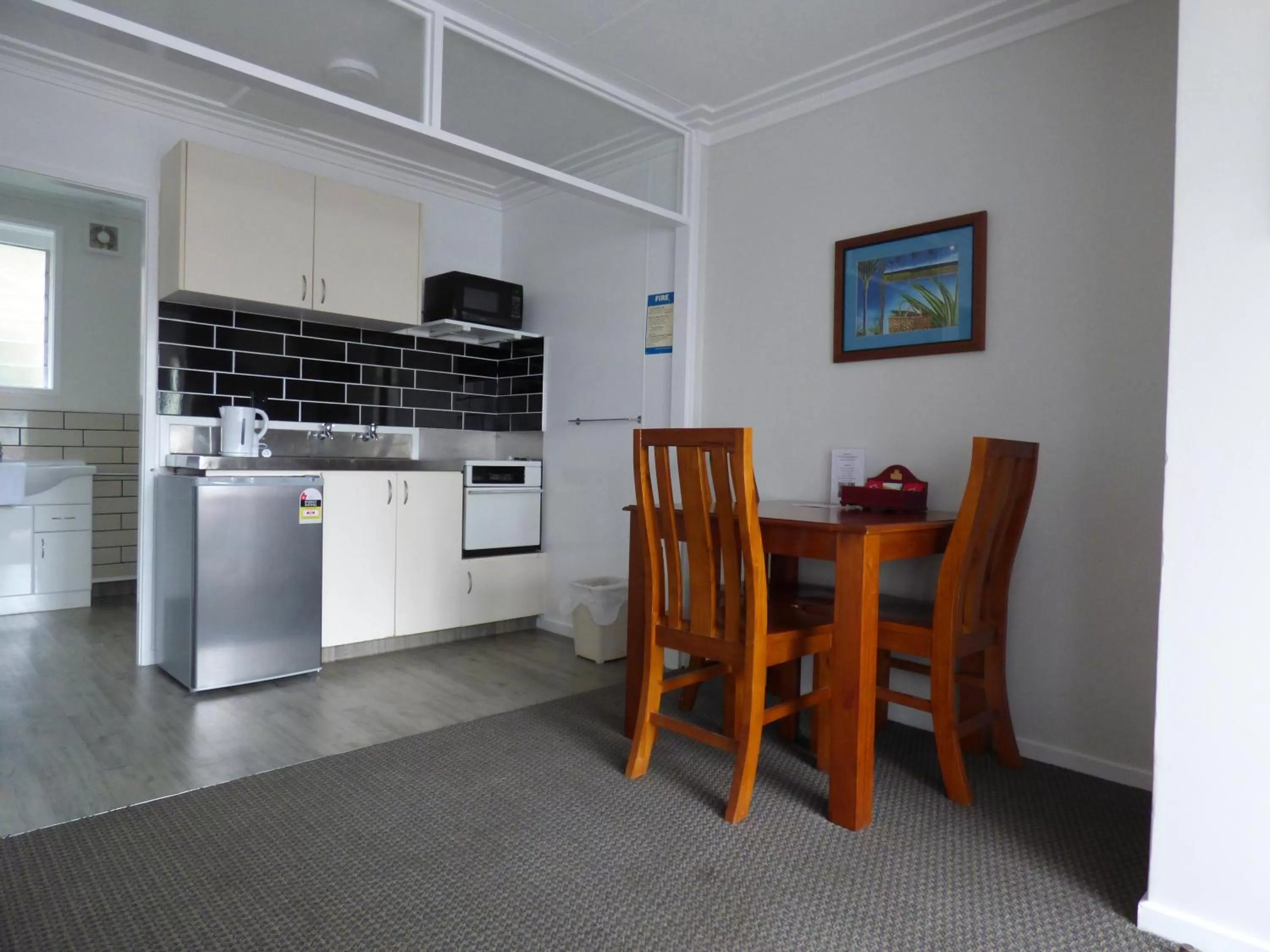 Kitchen or kitchenette in Sahara Motels