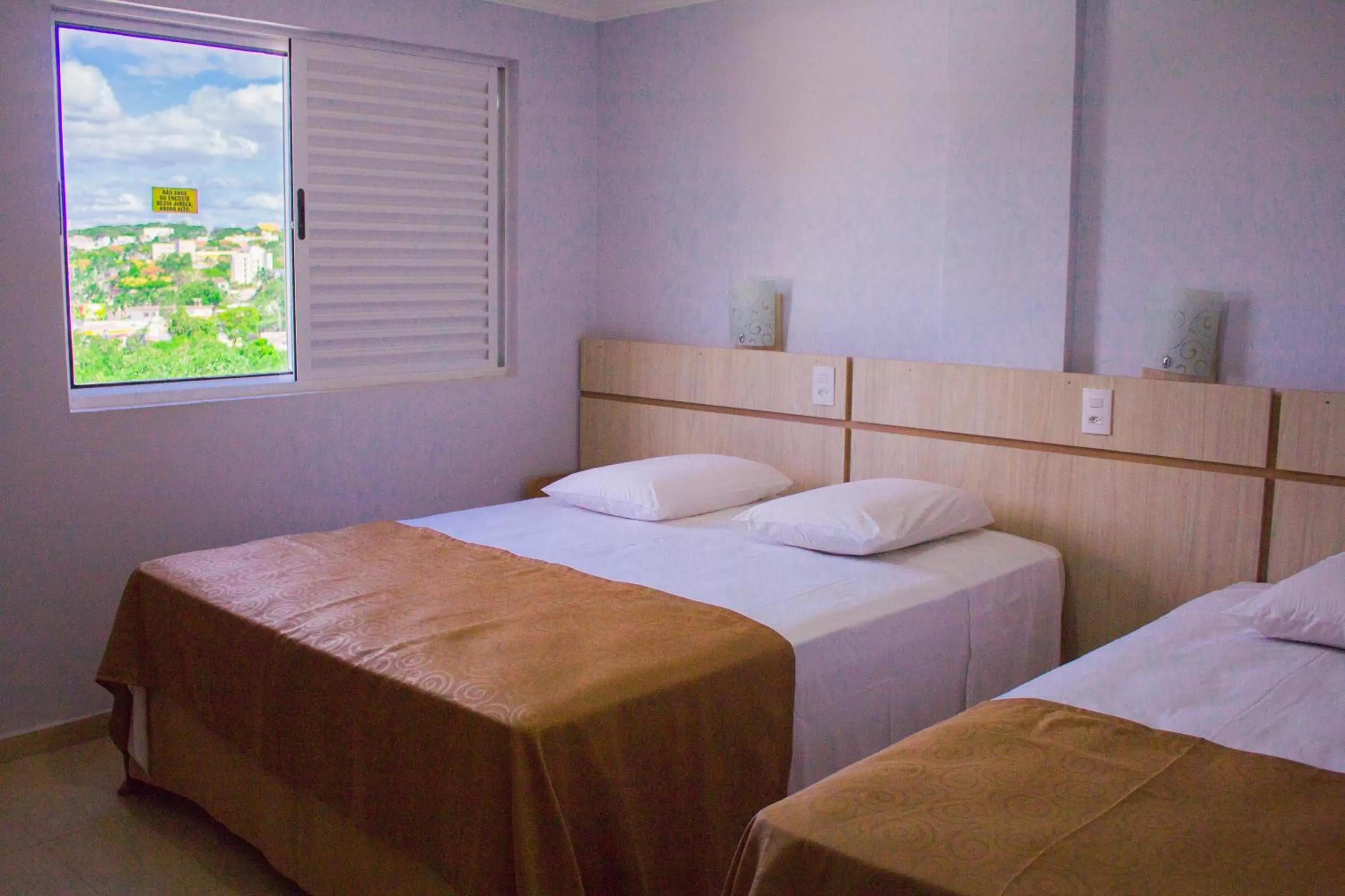 Bed in Hotel Baviera Iguassu