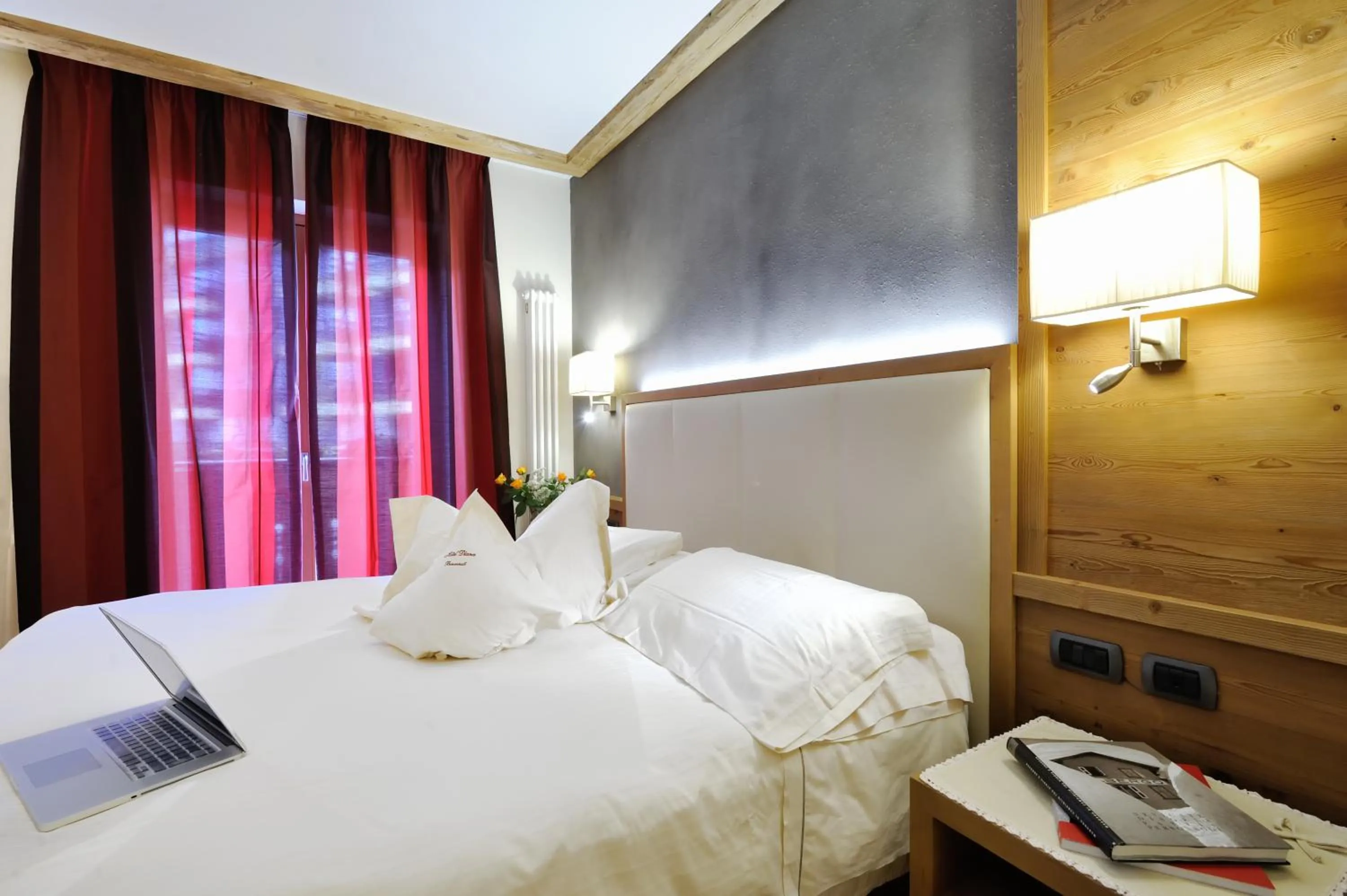 Bed in Boutique Hotel Diana