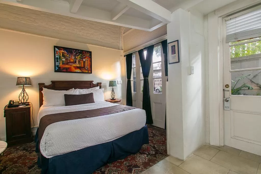 Bedroom, Bed in Lafitte Hotel & Bar