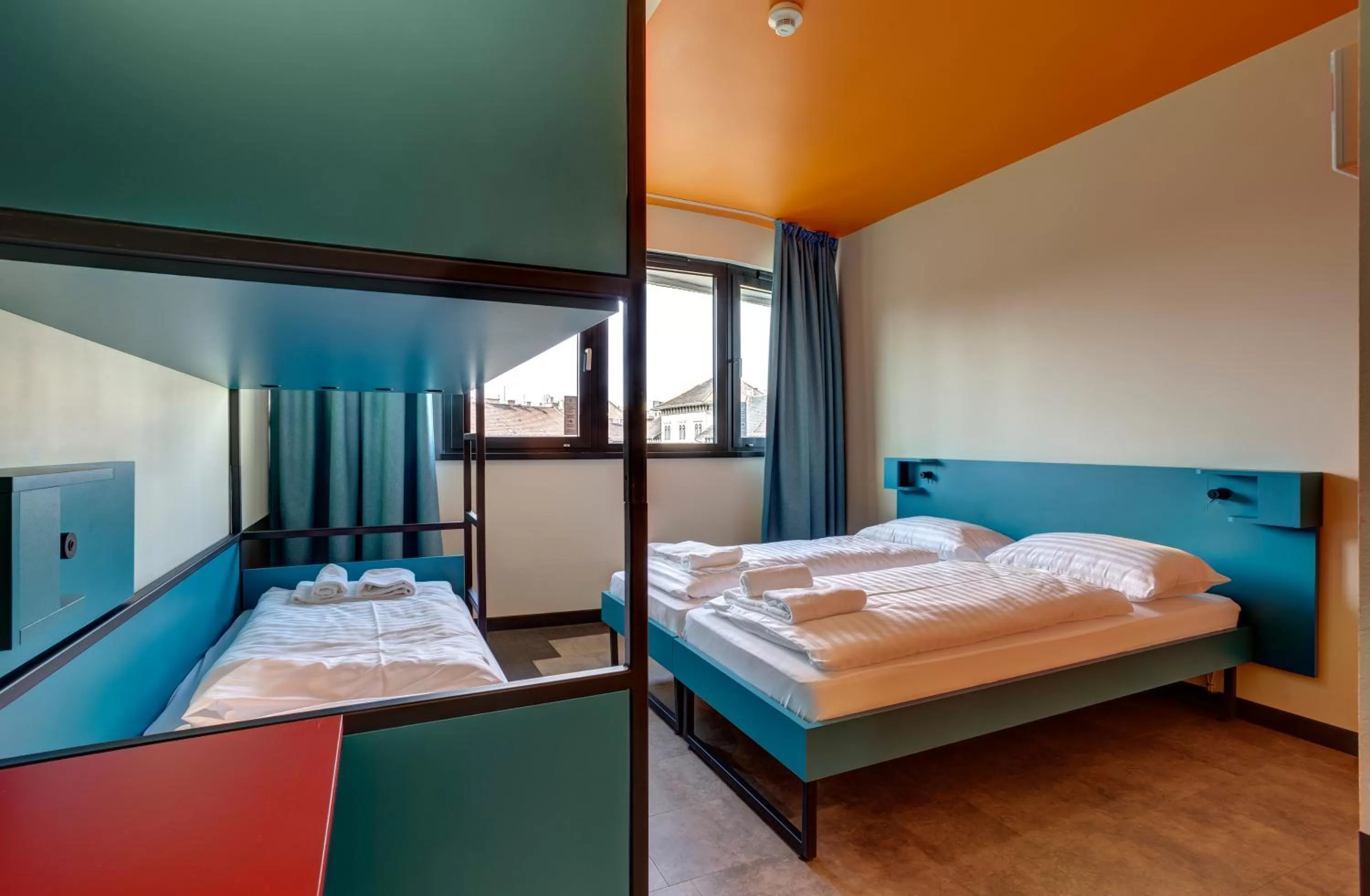 Photo of the whole room, Bed in MEININGER Budapest Great Market Hall