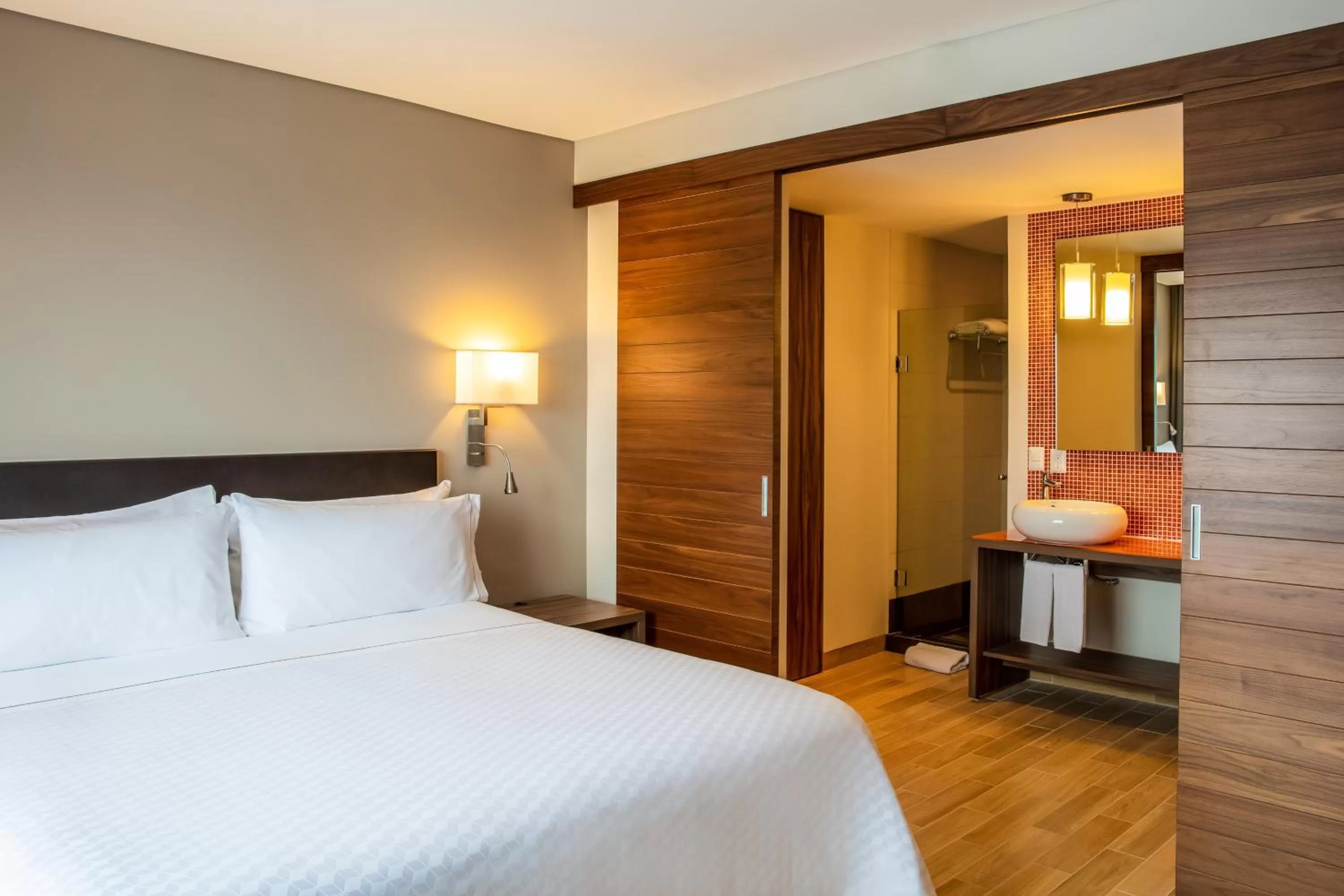 Photo of the whole room, Bed in Fiesta Inn Tuxtla Fashion Mall