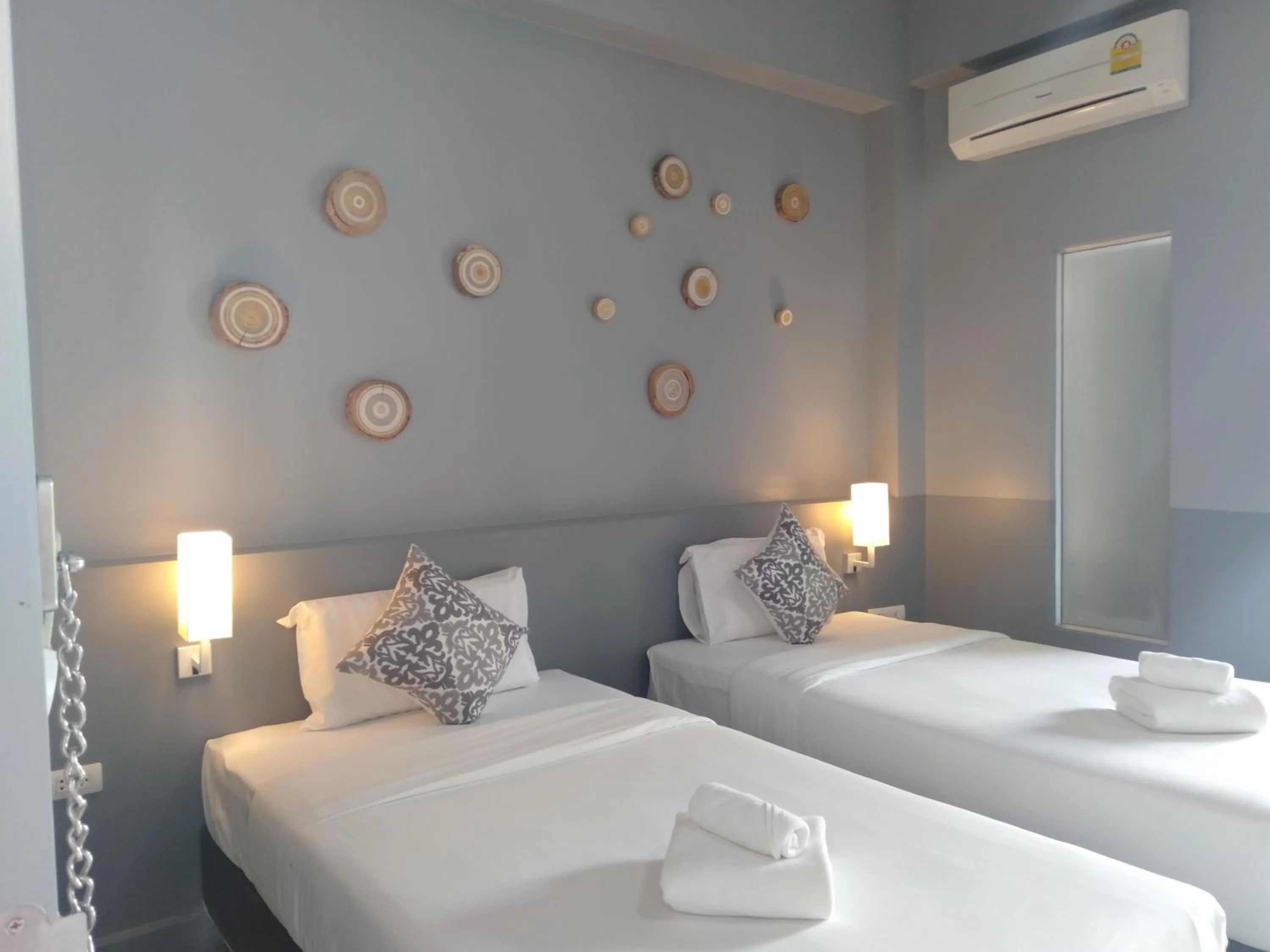 Bed in The Rubber Hotel Phuket