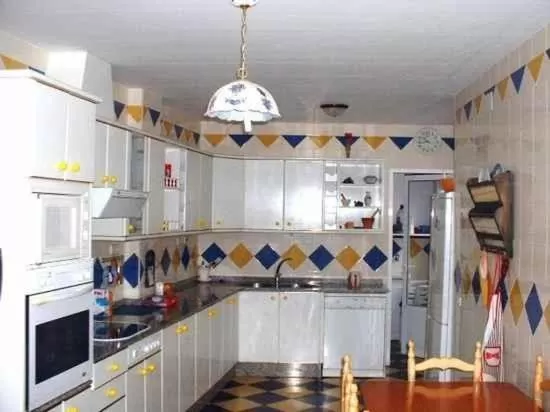 Communal kitchen in La Casona del Abuelo Parra