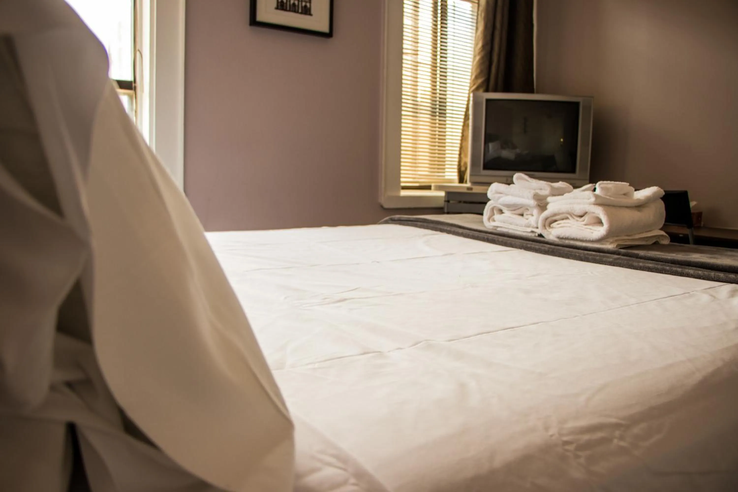 Bed in Saint Lawrence Residences and Suites