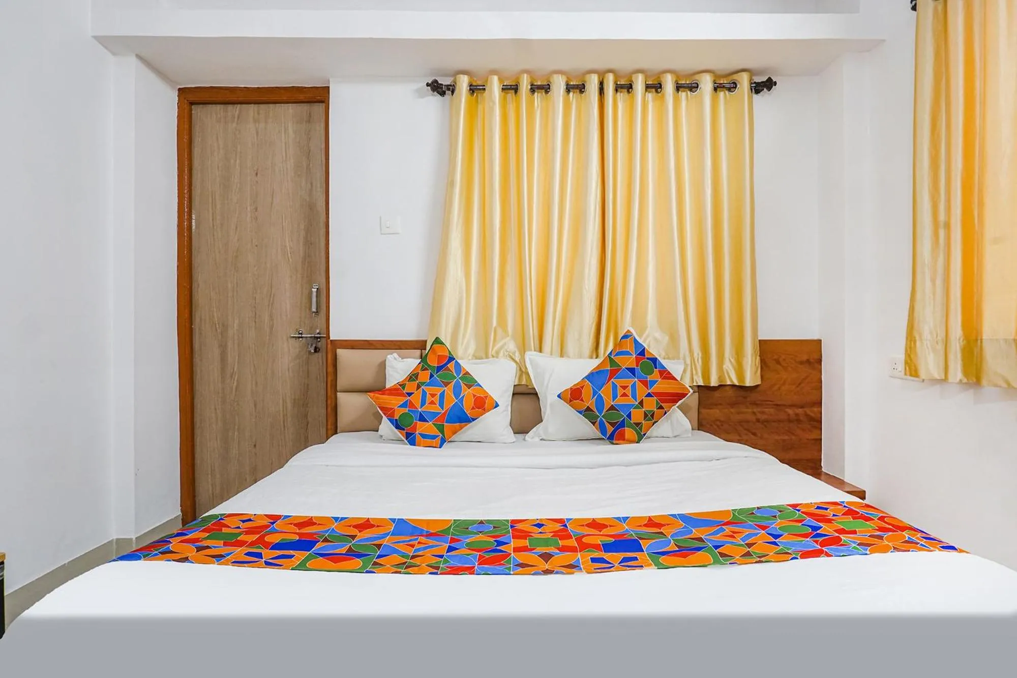 Bed in FabHotel Lake View - Chinmaya Vitthal Mandir
