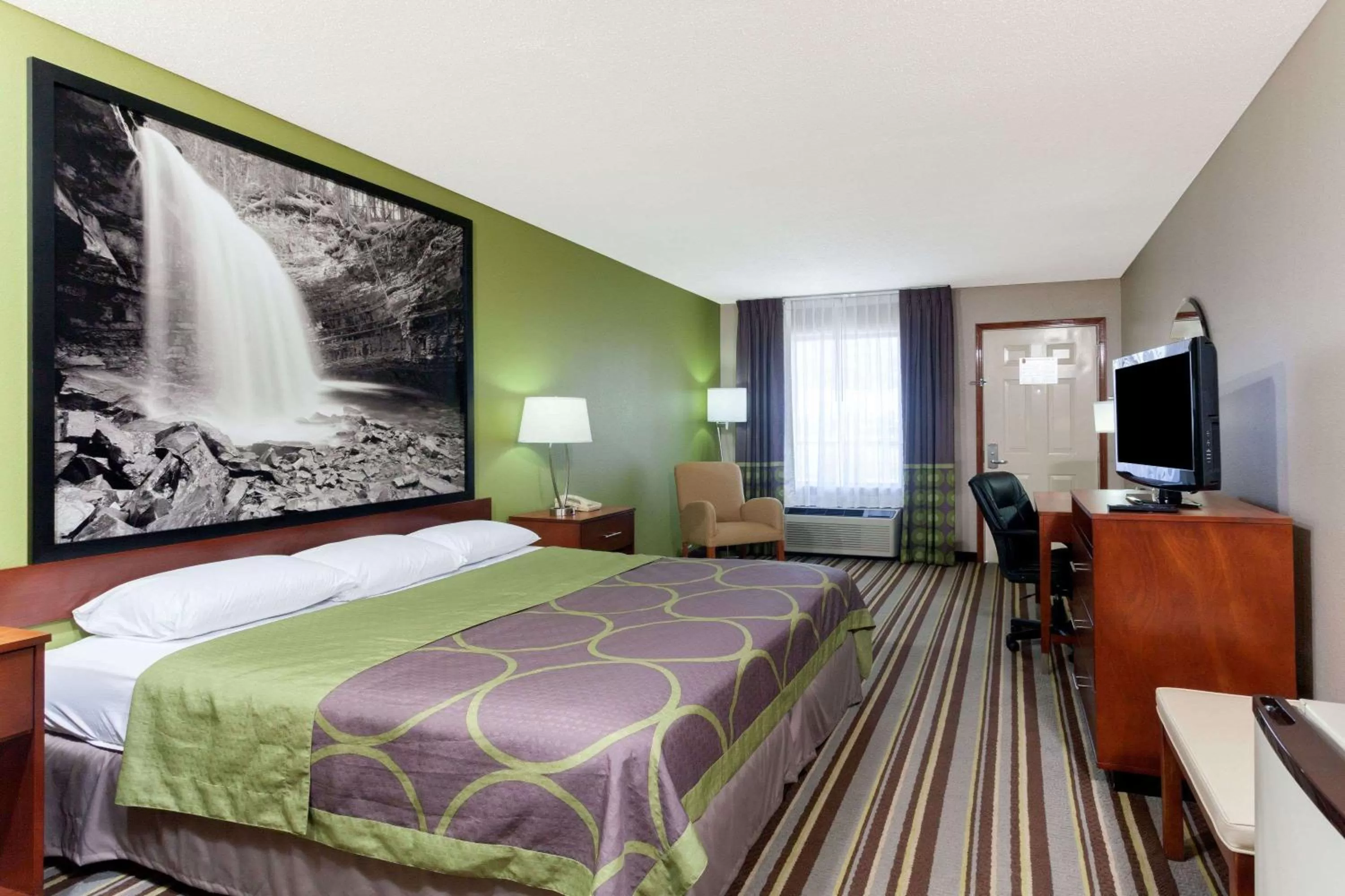 On site, Bed in Super 8 by Wyndham Clarksville Northeast