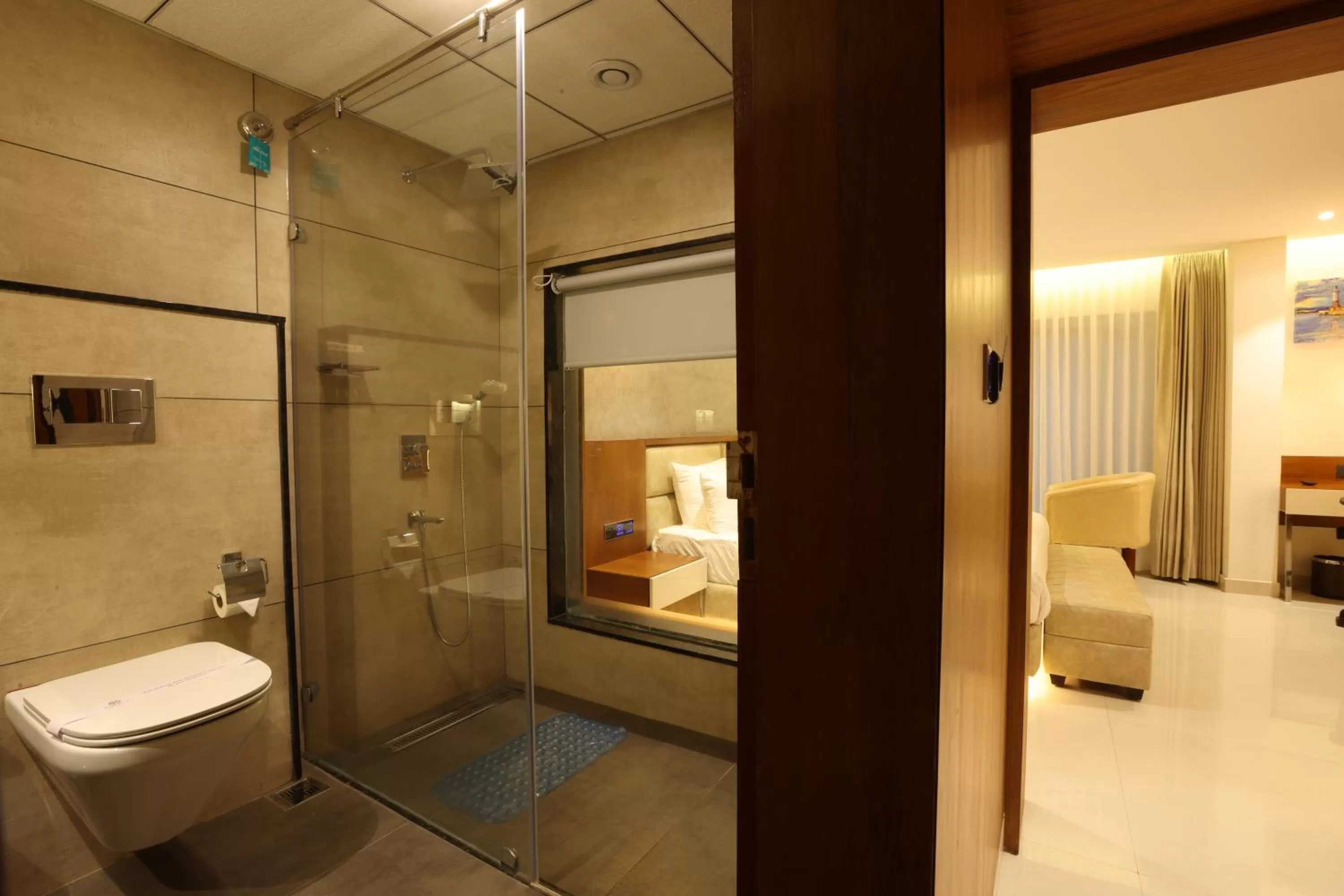 Bathroom in Royal Plaza Suites by RAK Rooms, Mangaluru