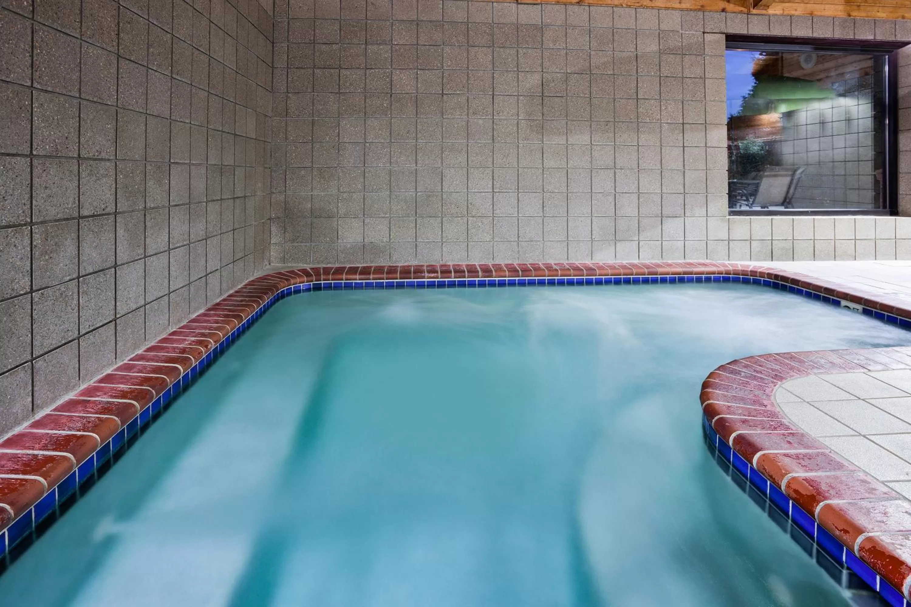 Swimming pool in AmericInn by Wyndham Plover Stevens Point