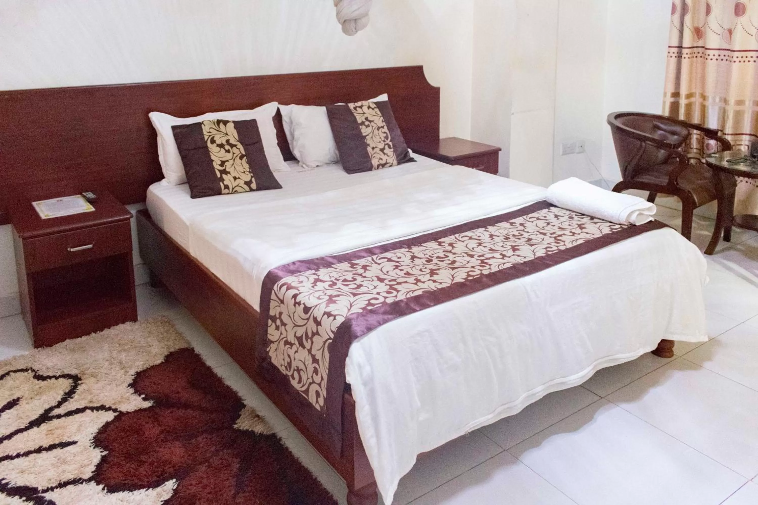 Bed in Sunrise Hotel Kampala