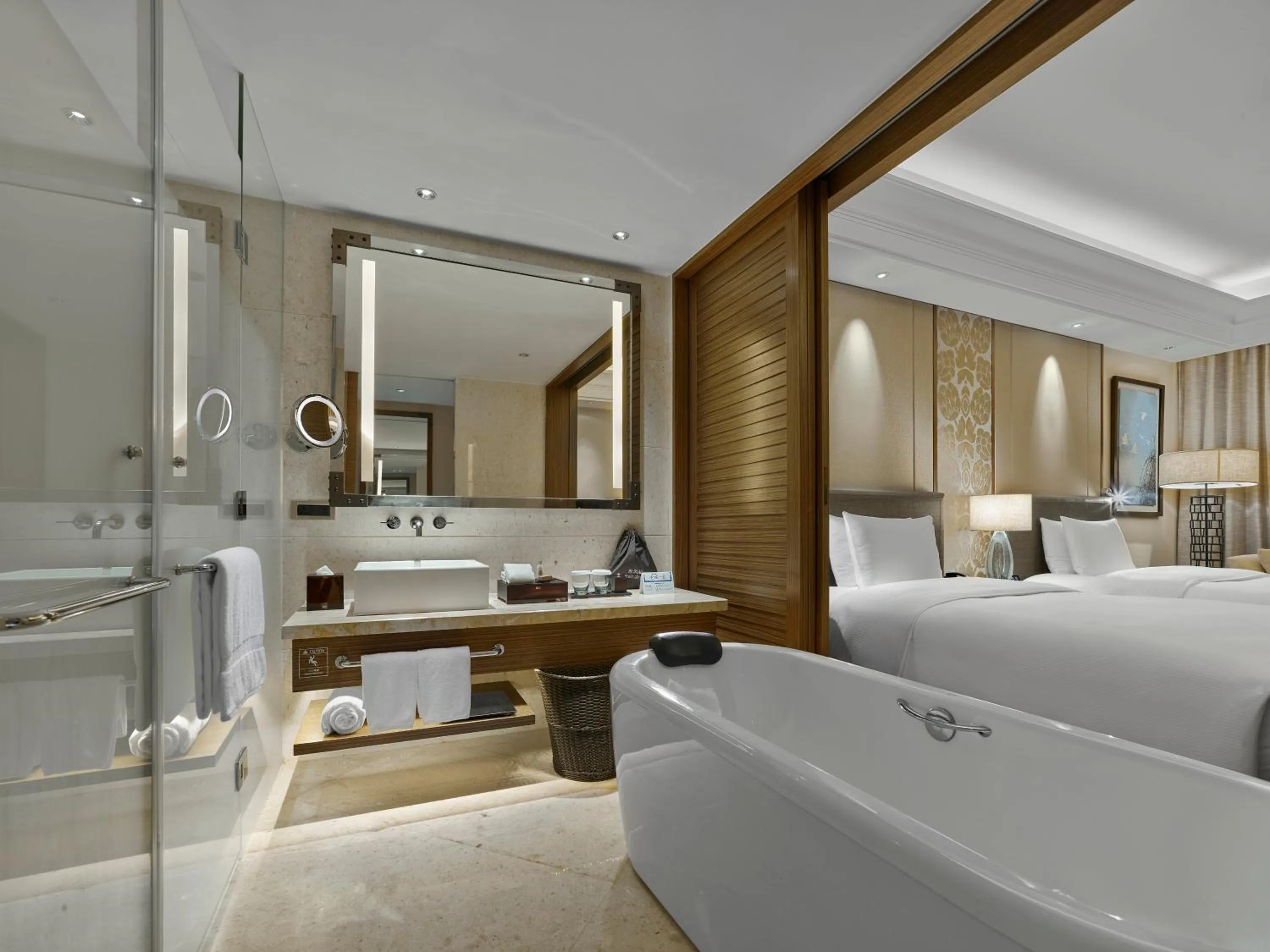 Bathroom, Bed in Hilton Haikou Meilan - Beachfront Hotel