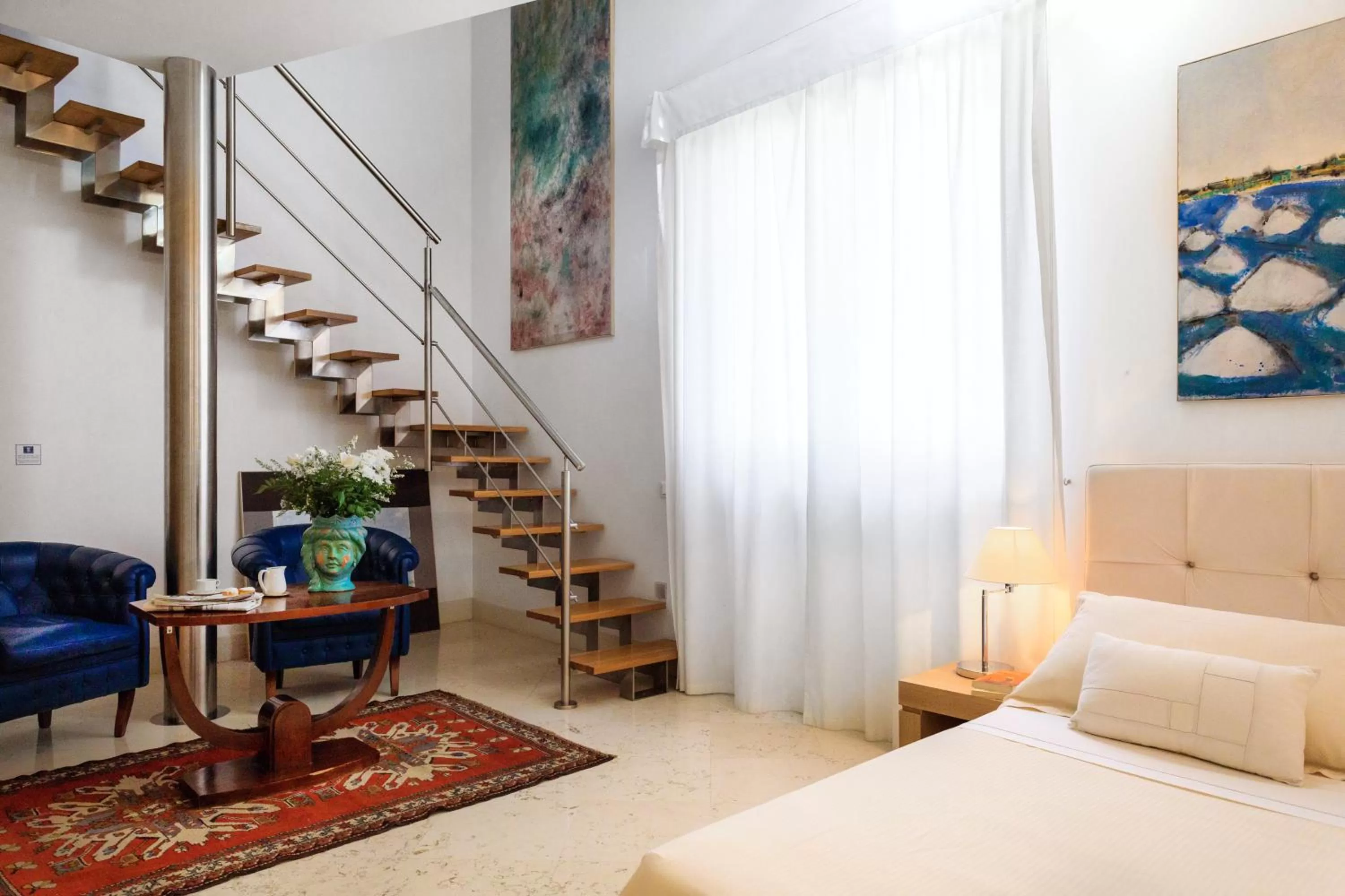 Living room, Bed in Palazzo Brunaccini Boutique Hotel