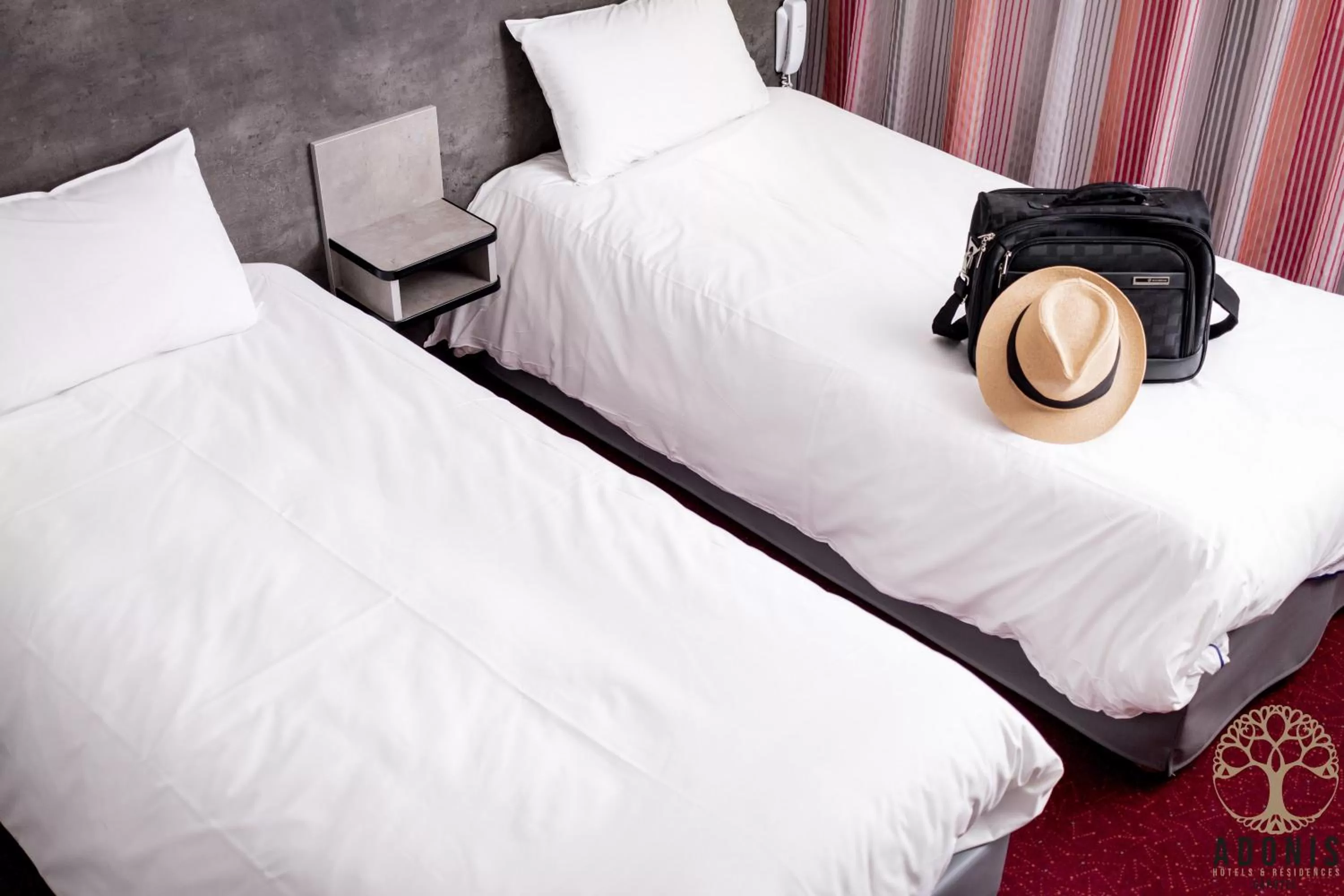 Bed in Adonis Gapotel