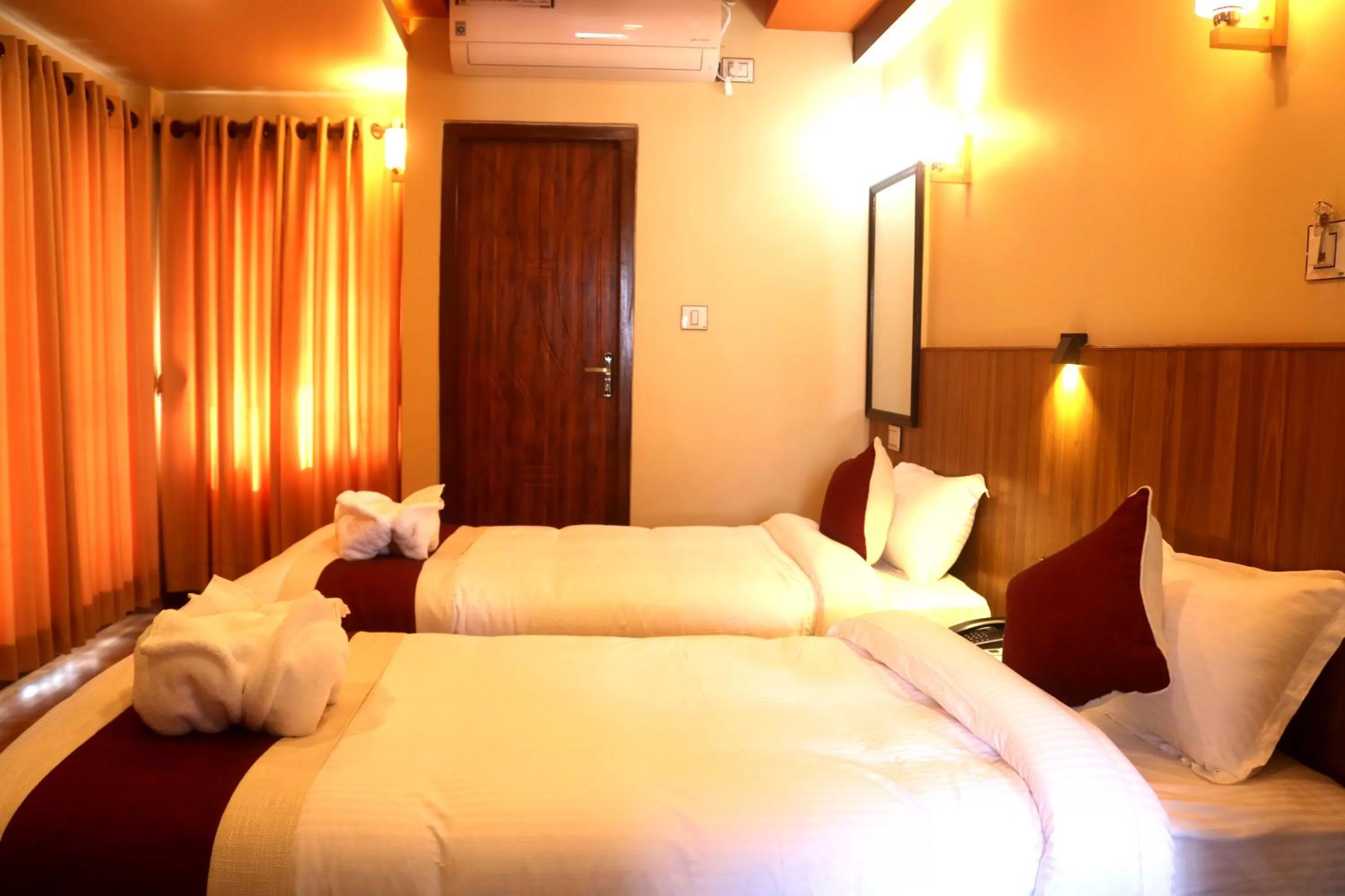 Bedroom, Bed in Hotel Family Ties Pvt. Ltd.