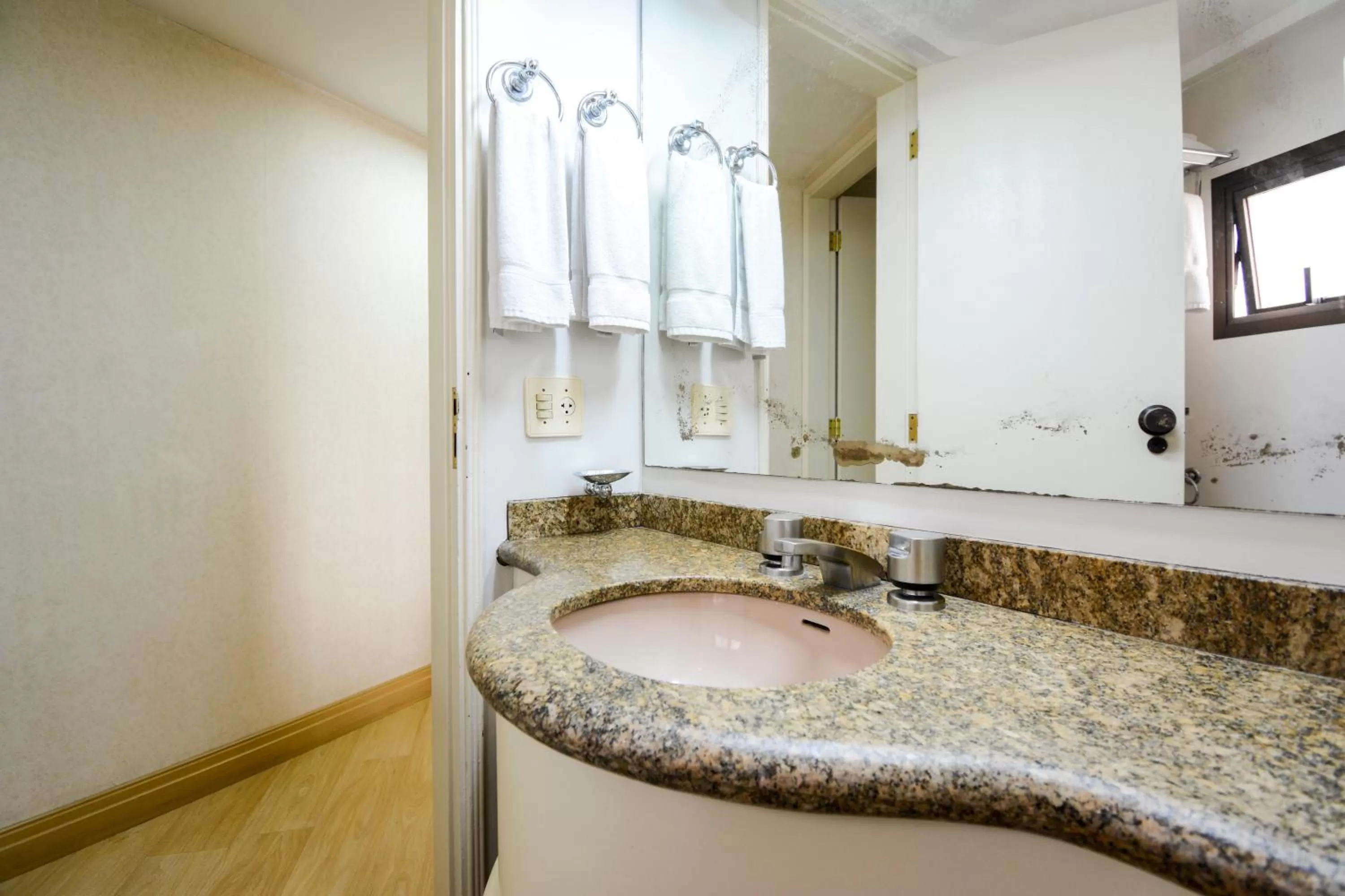 Bathroom in Wall Street Apartments by BnbHost