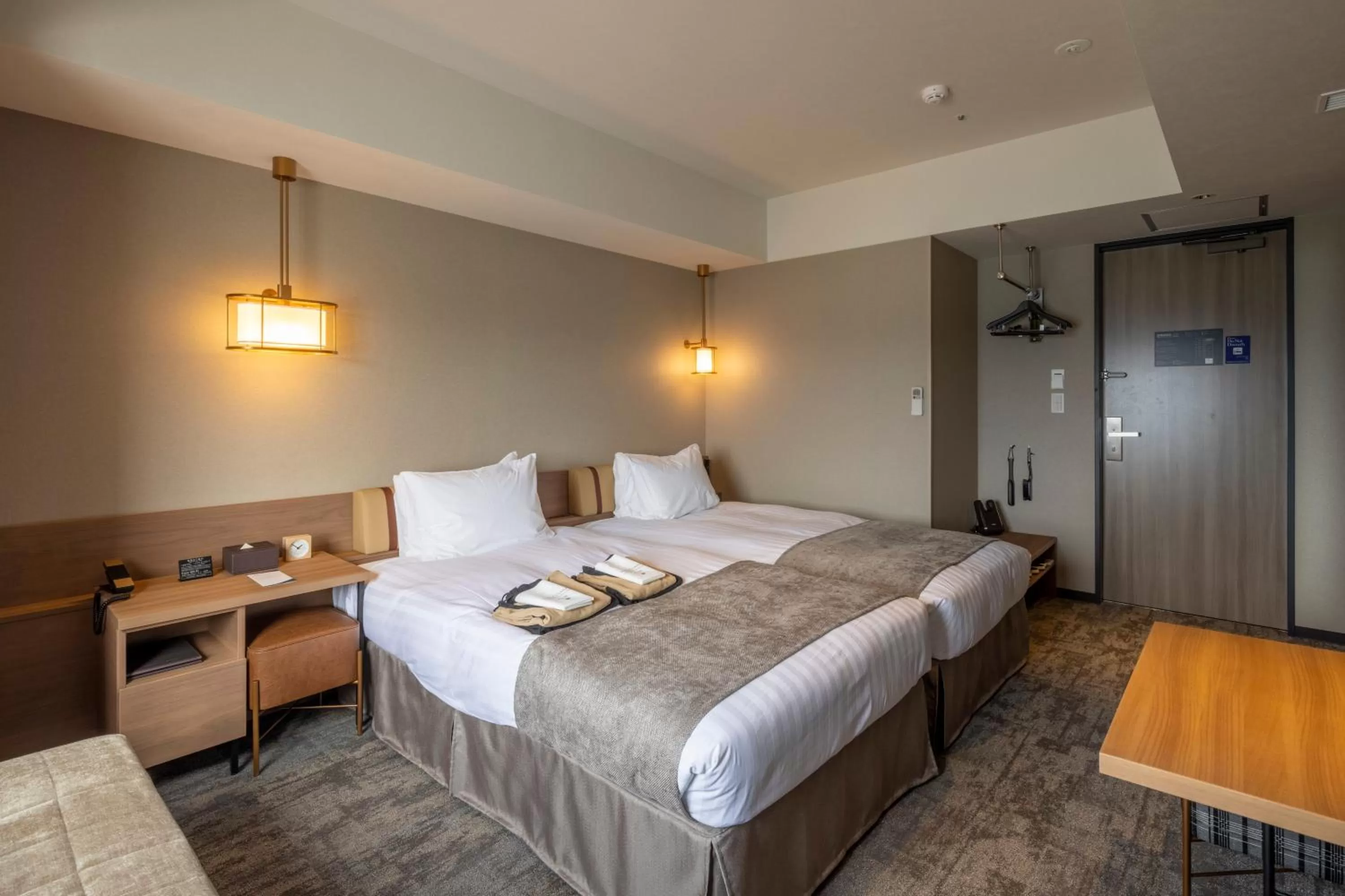 Bed in Tokyu Stay Hakodate Asaichi Akarinoyu