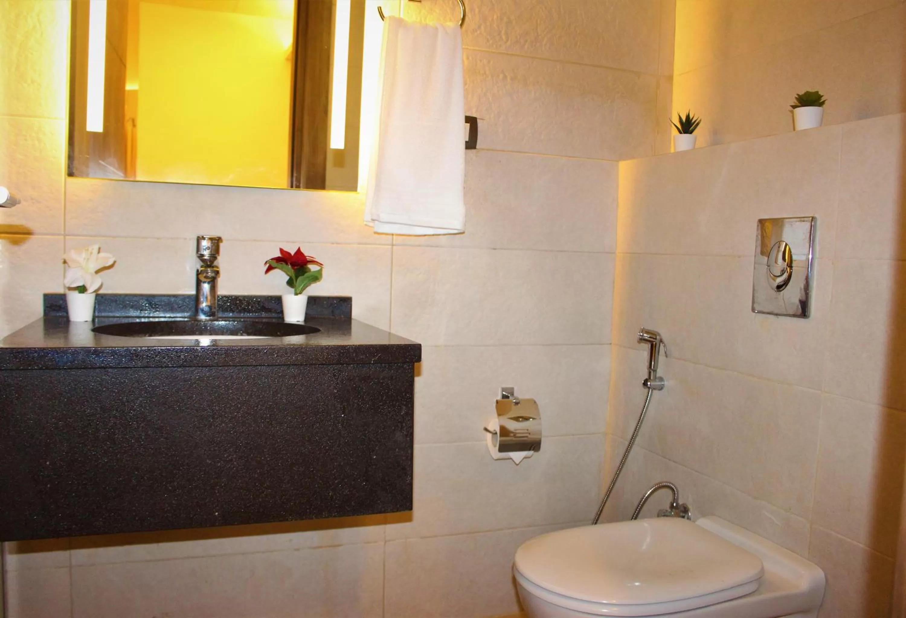 Bathroom in New MerryLand Hotel