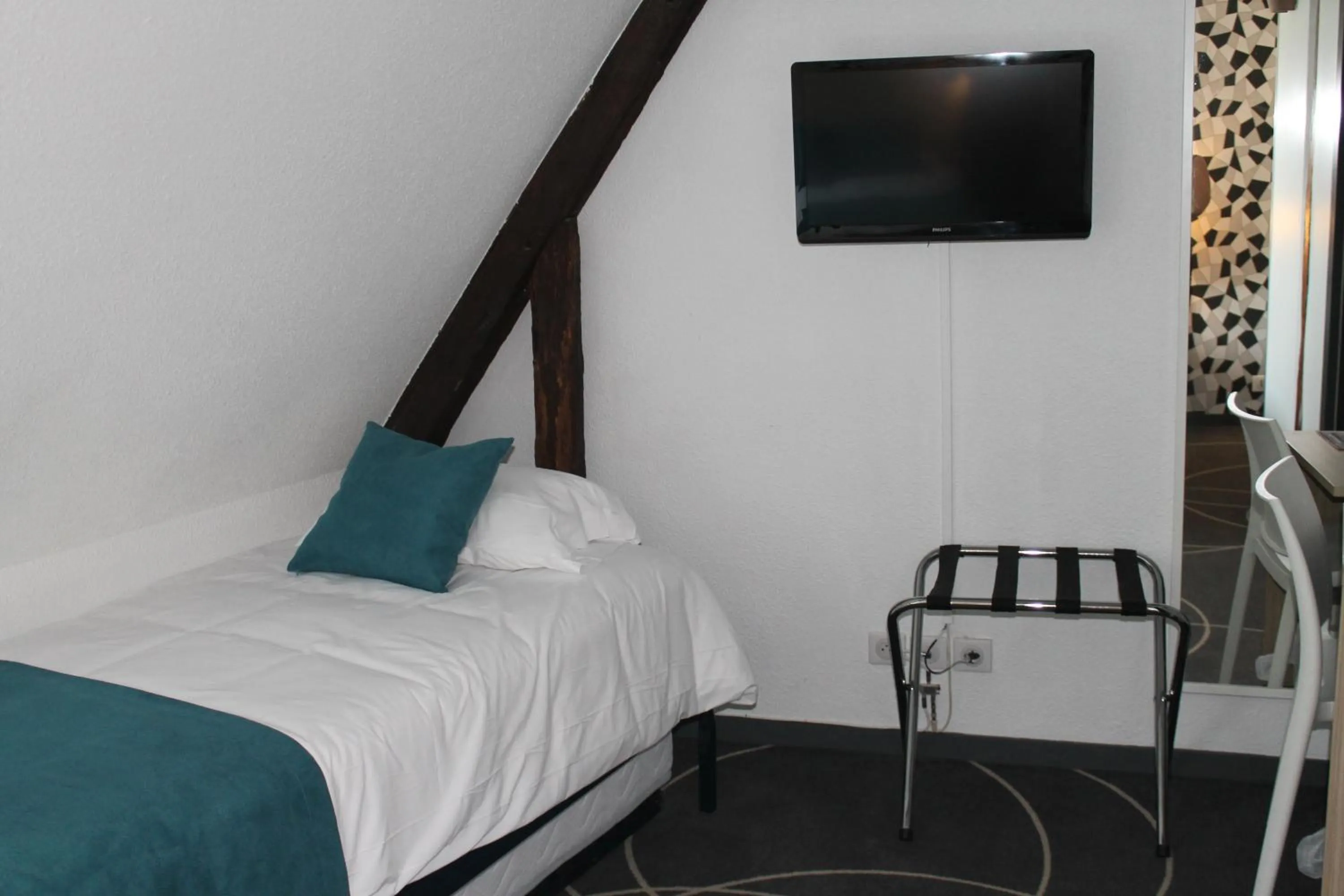 Bed in Hôtel Le Blason