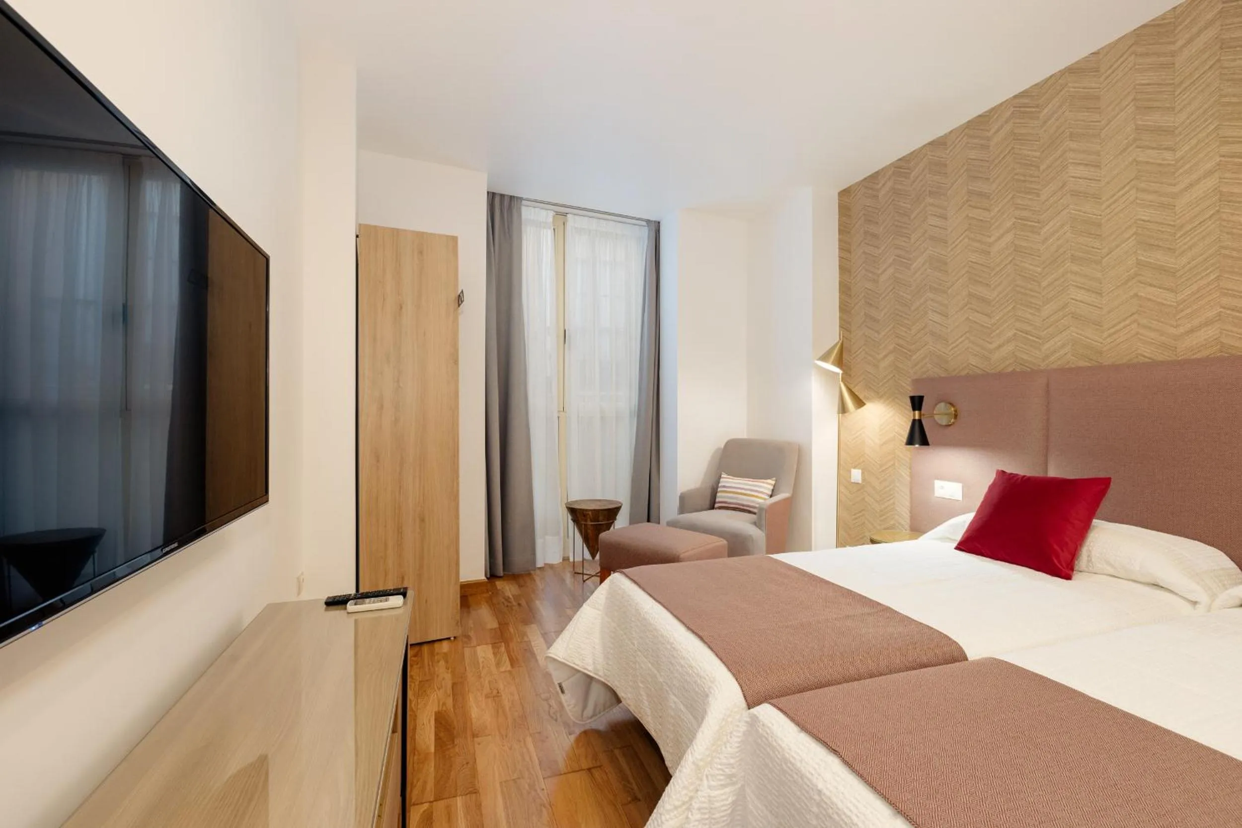 Bed in Apartamentos Debambú