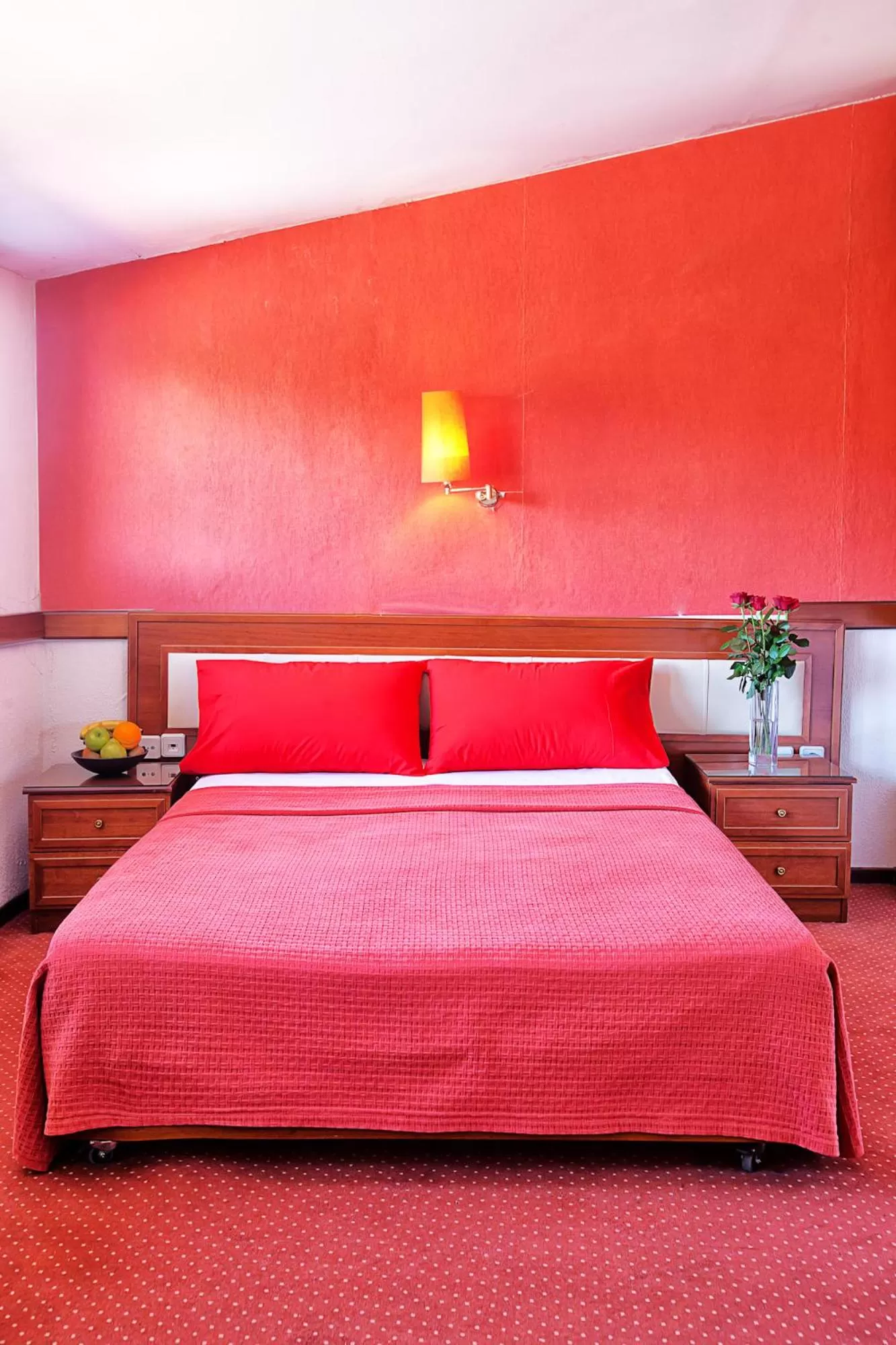 Property building, Bed in Anastassiou Hotel - Bike and motorcycle friendly hotel