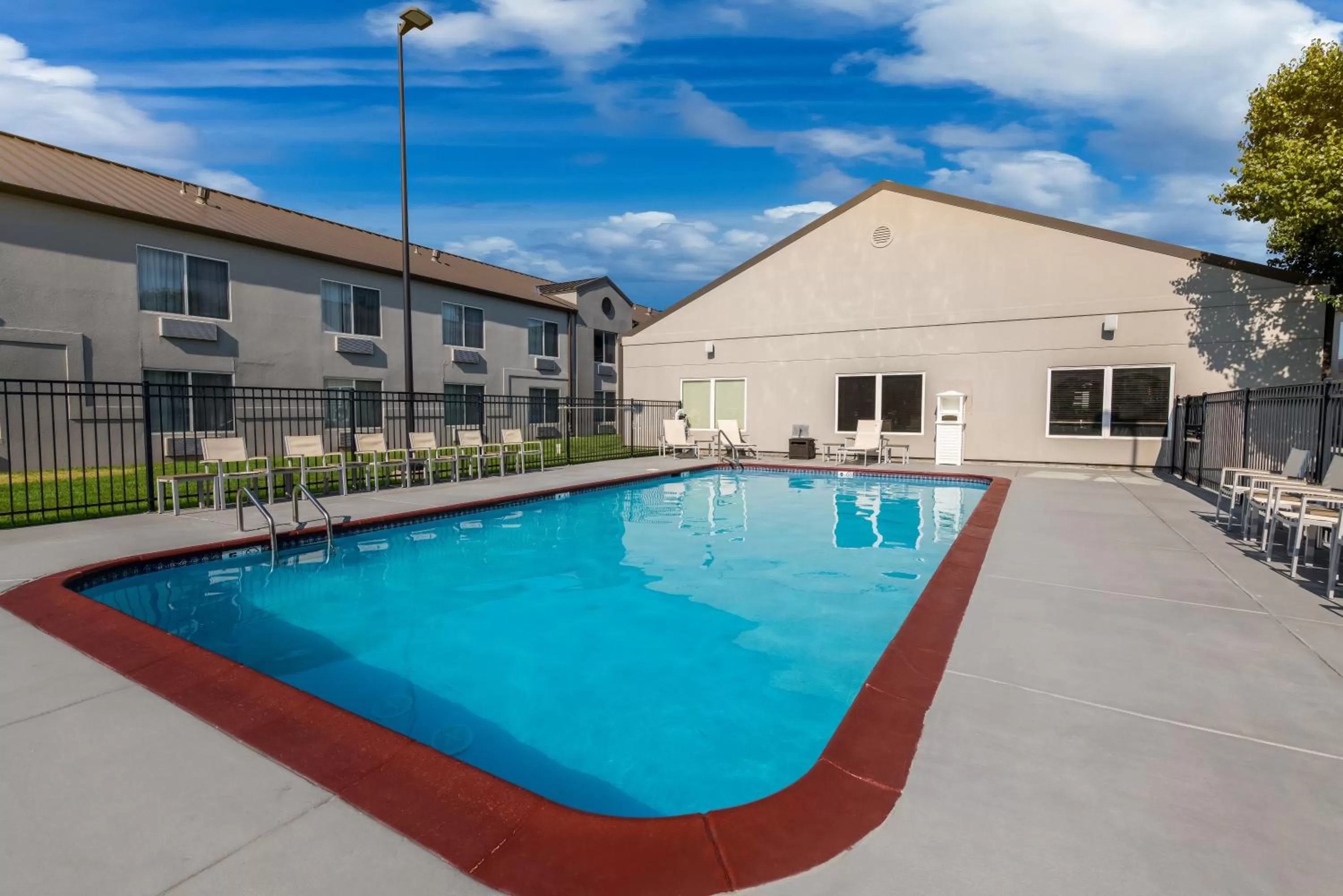 Swimming pool in Country Inn & Suites by Radisson, Wichita East, KS