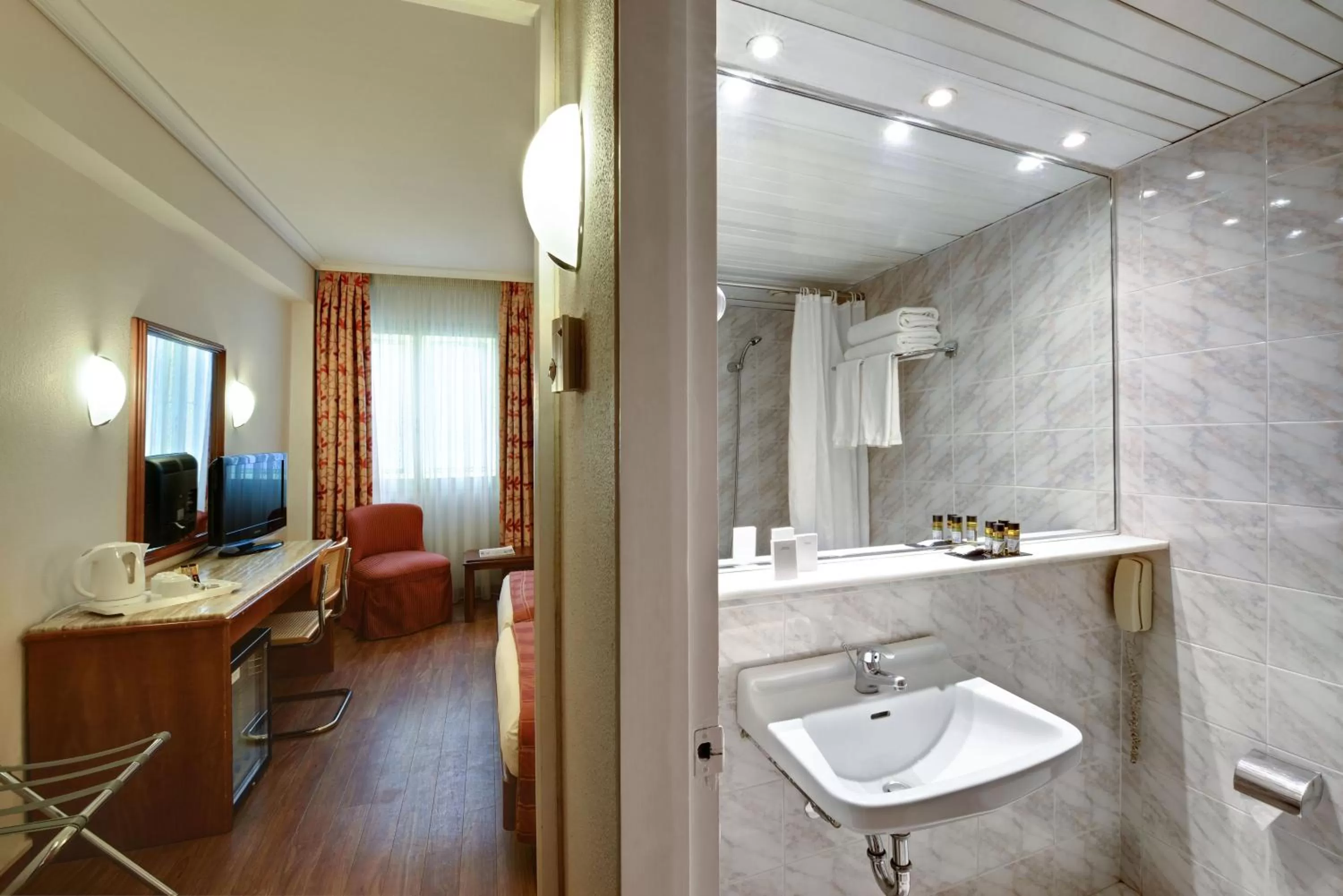 Bathroom in Titania Hotel