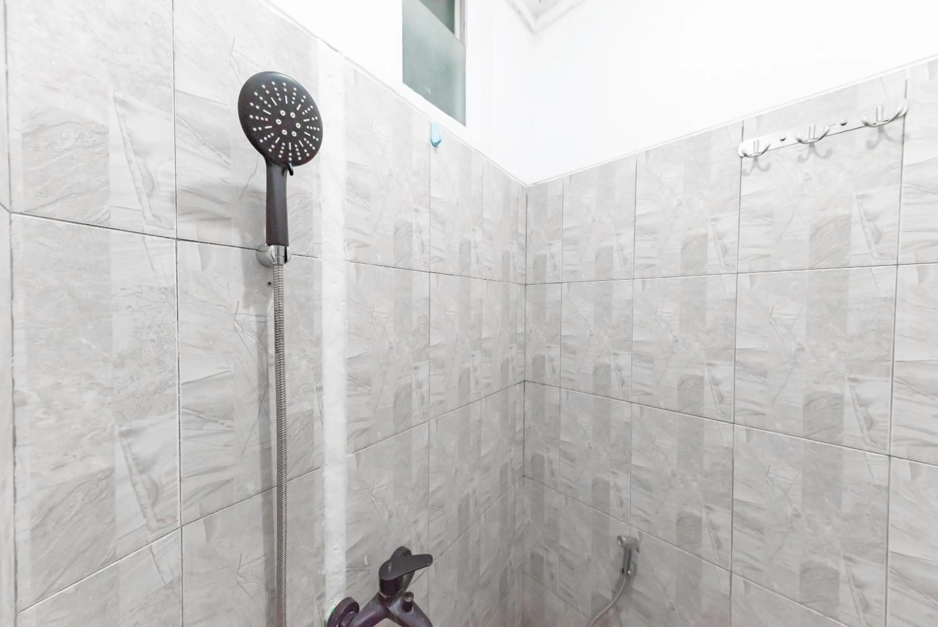 Bathroom in RedDoorz near Botani Square Mall