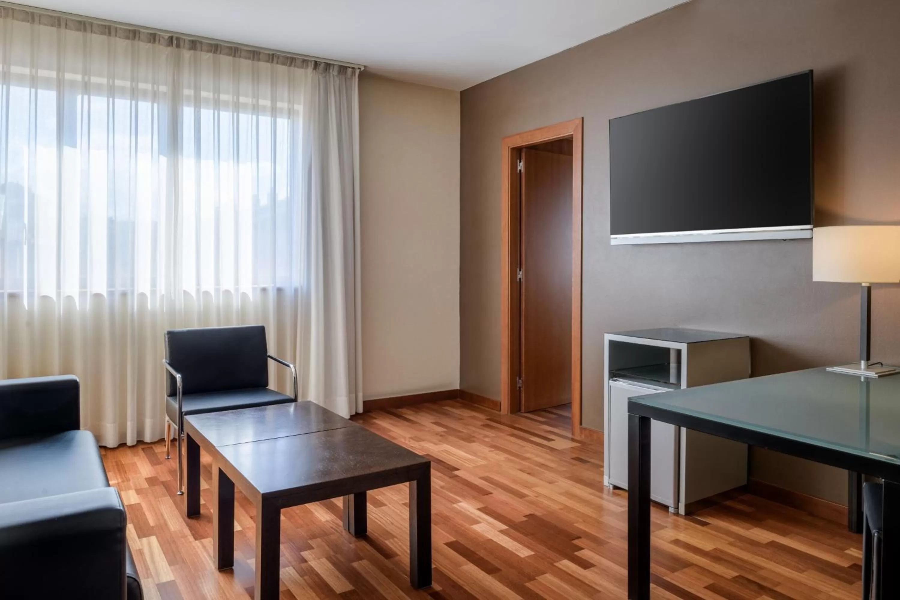 Living room in AC Hotel Guadalajara by Marriott, Spain