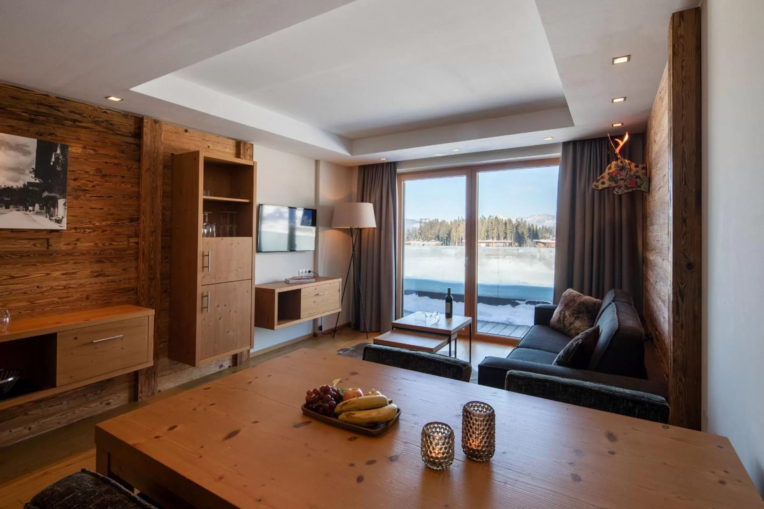 Living room in Berg & Golf Resort Westendorf by ALPS RESORTS