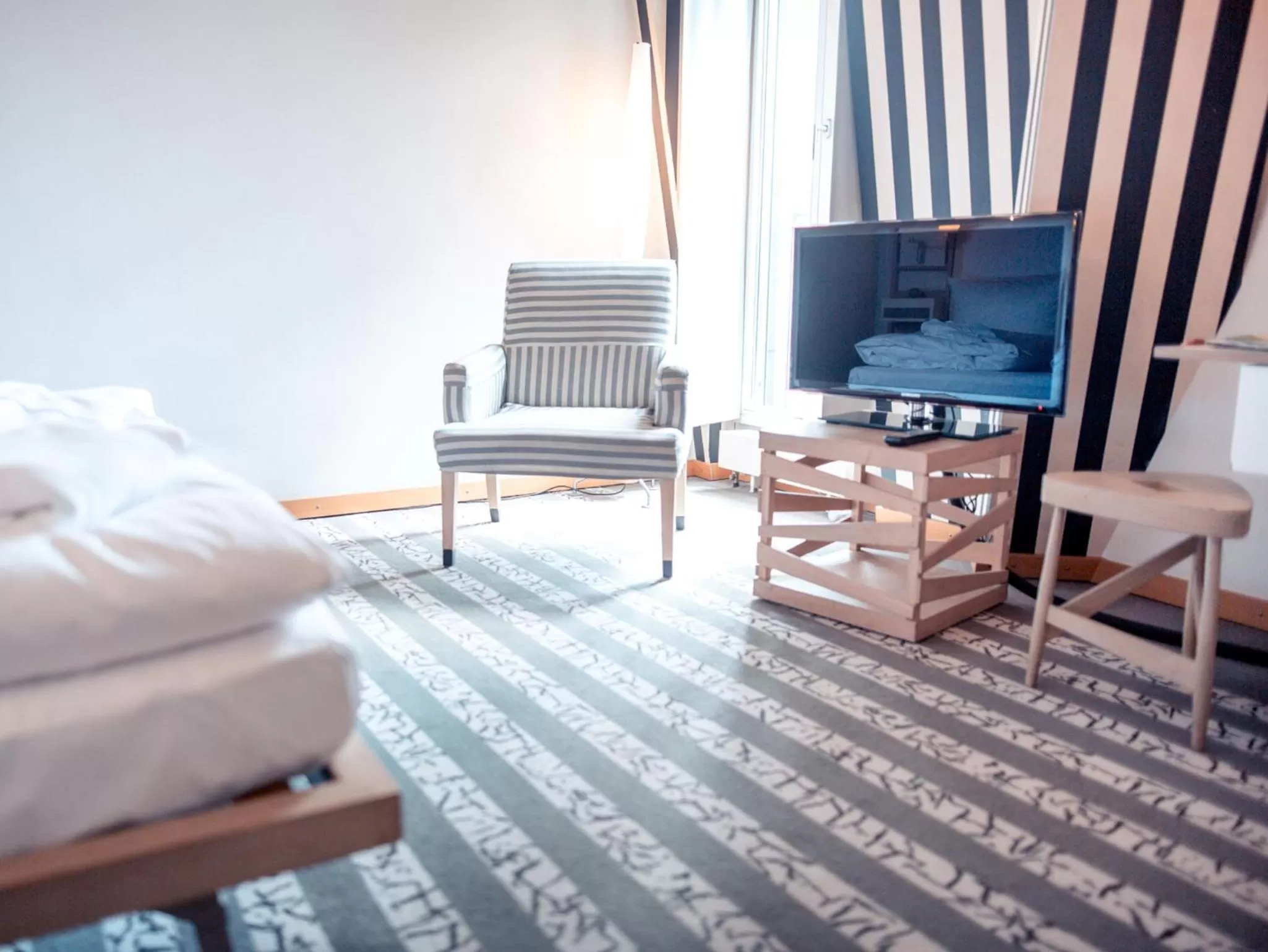 Bed in Hotel Bleibtreu Berlin by Golden Tulip