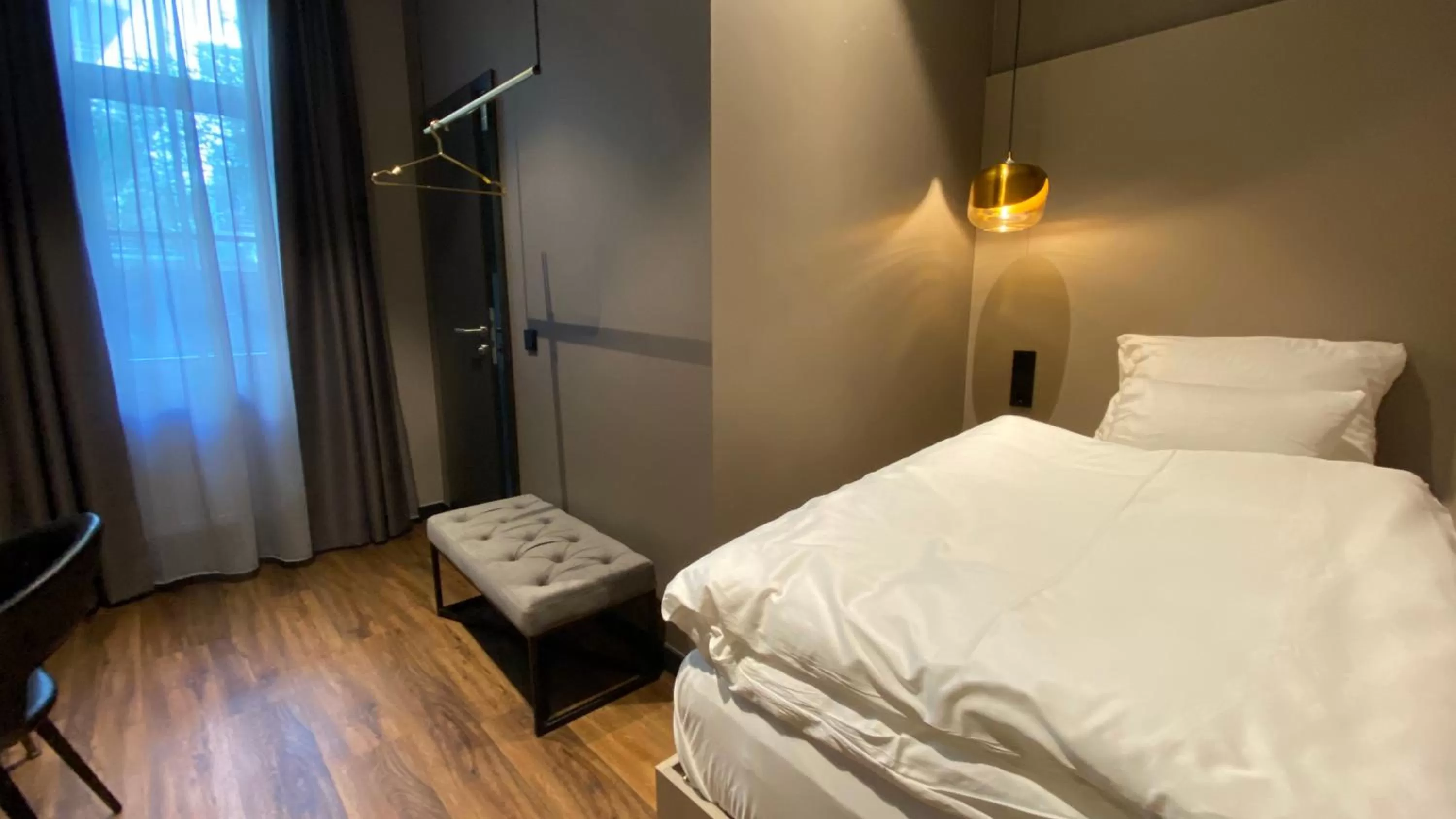 Photo of the whole room, Bed in Munich Rooms Hotel