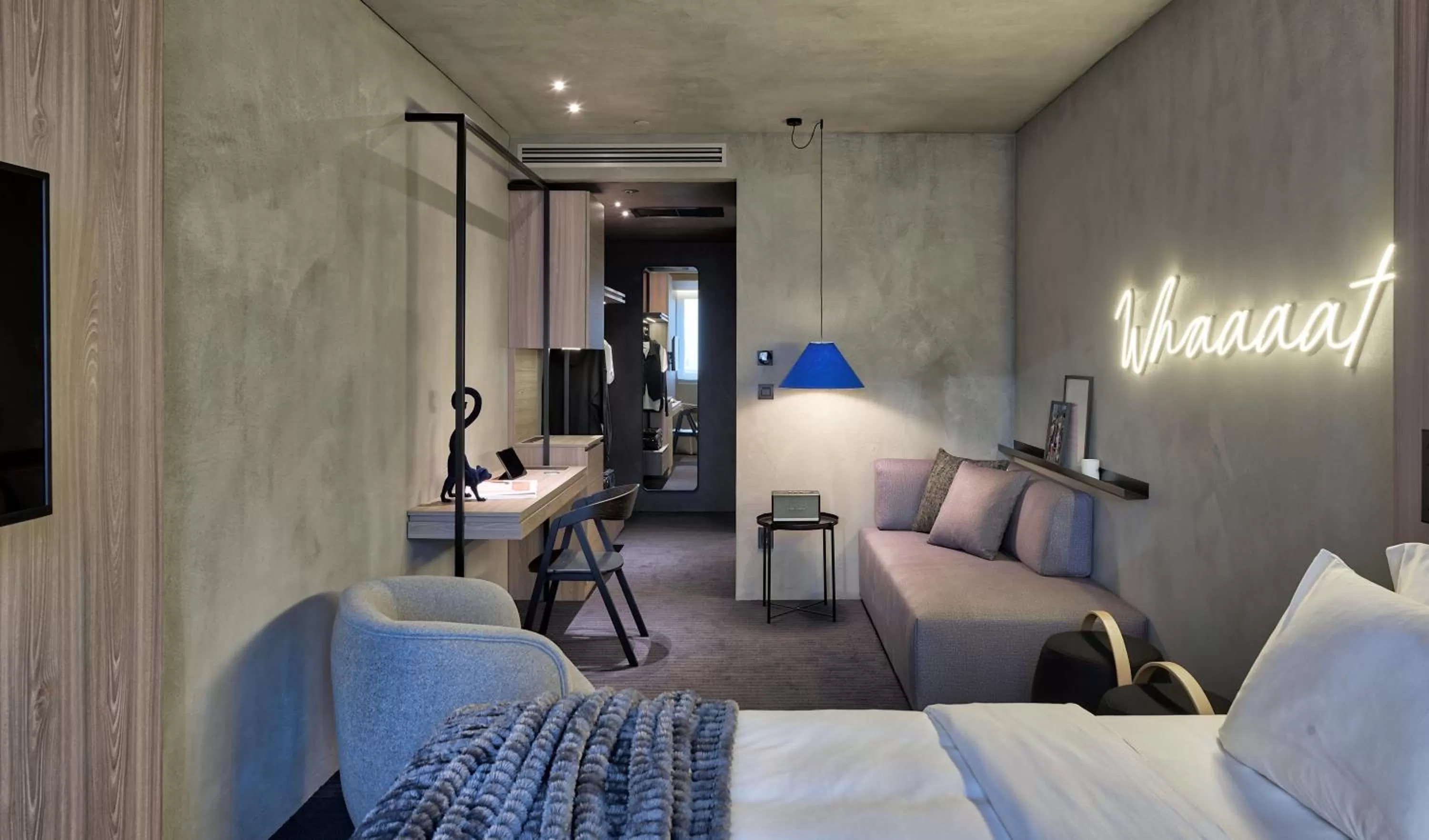 Living room, Bed in ONOMA Hotel