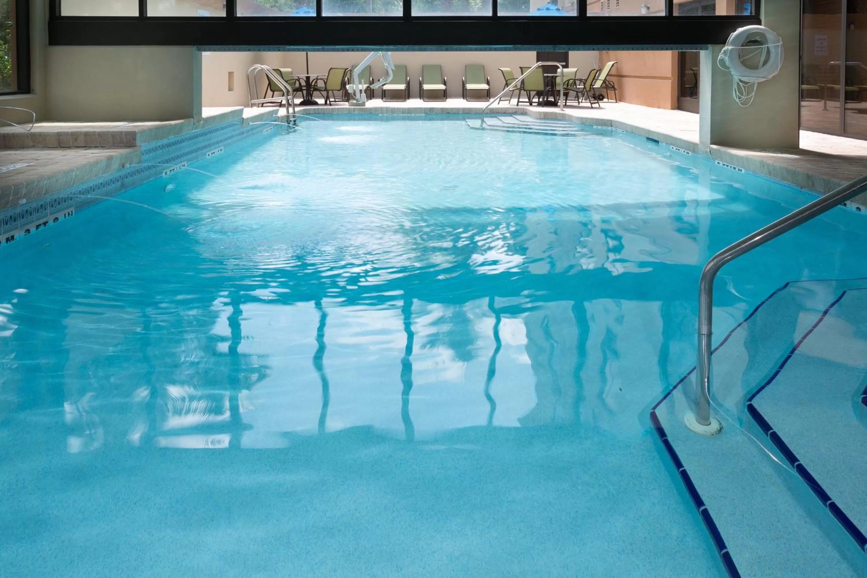 Swimming pool in Holiday Inn Express Hotel & Suites Jacksonville Airport by IHG