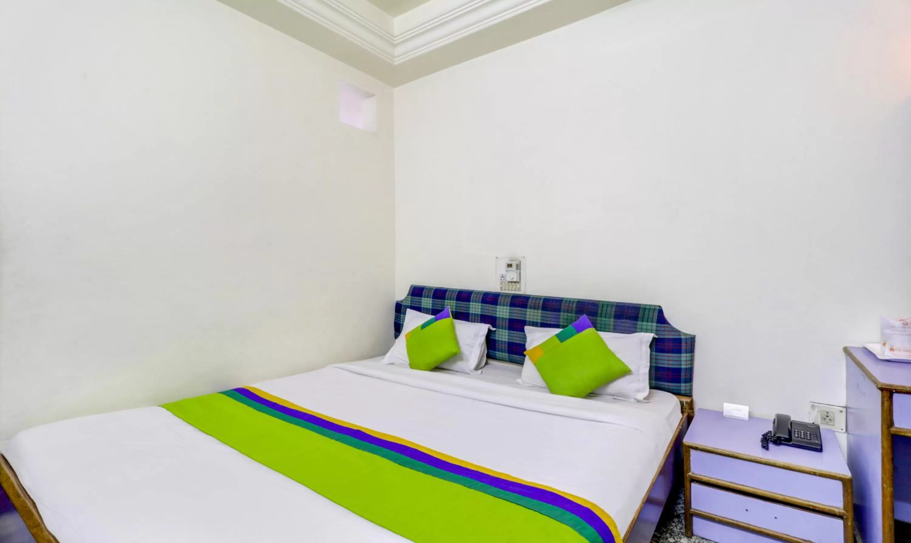 Bed in Treebo Trend Orange City