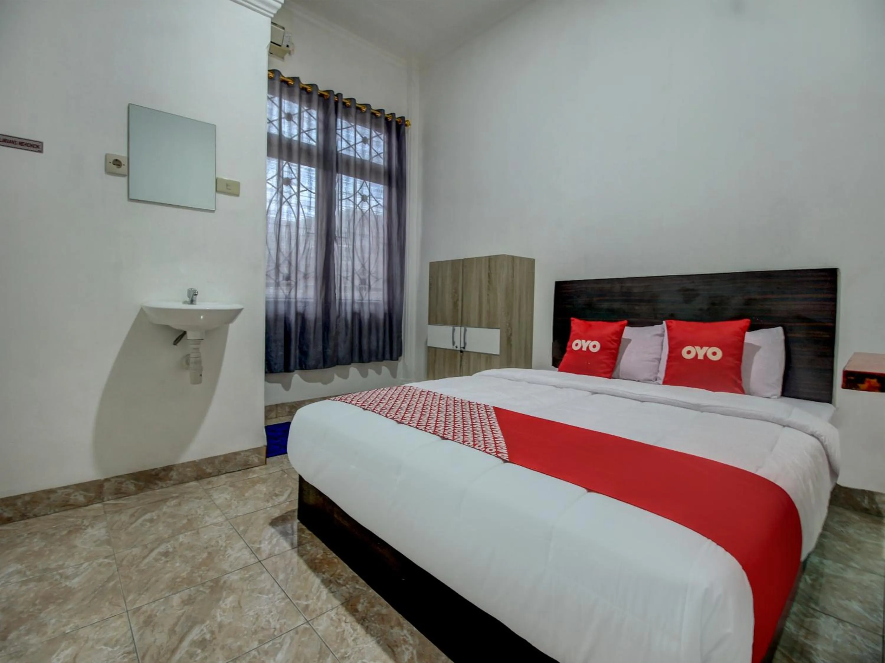 Bedroom in OYO 90224 Palembang Residence