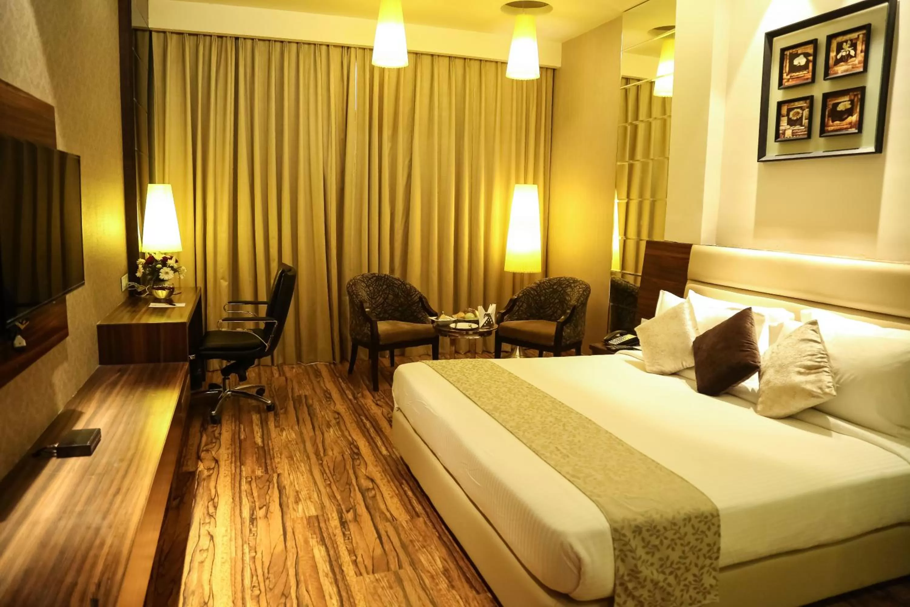 Photo of the whole room, Bed in The Vivaan Hotel & Resorts Karnal