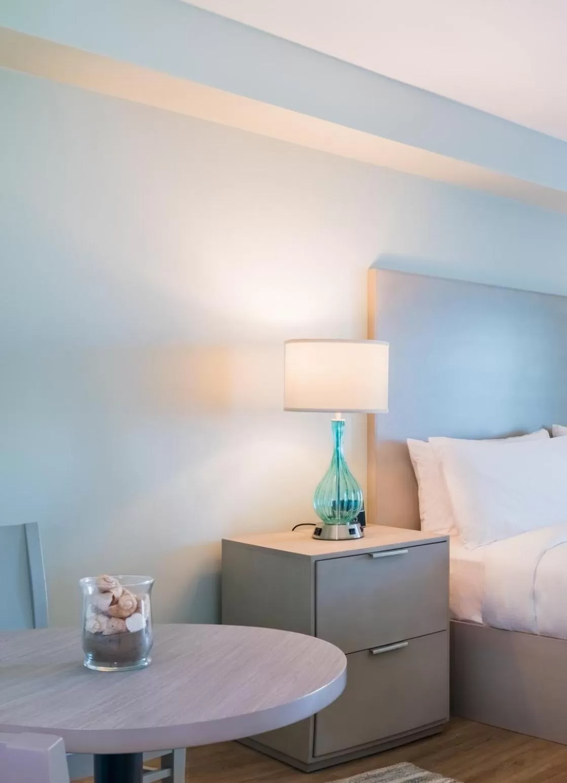 Bed in The Palms Oceanfront Hotel