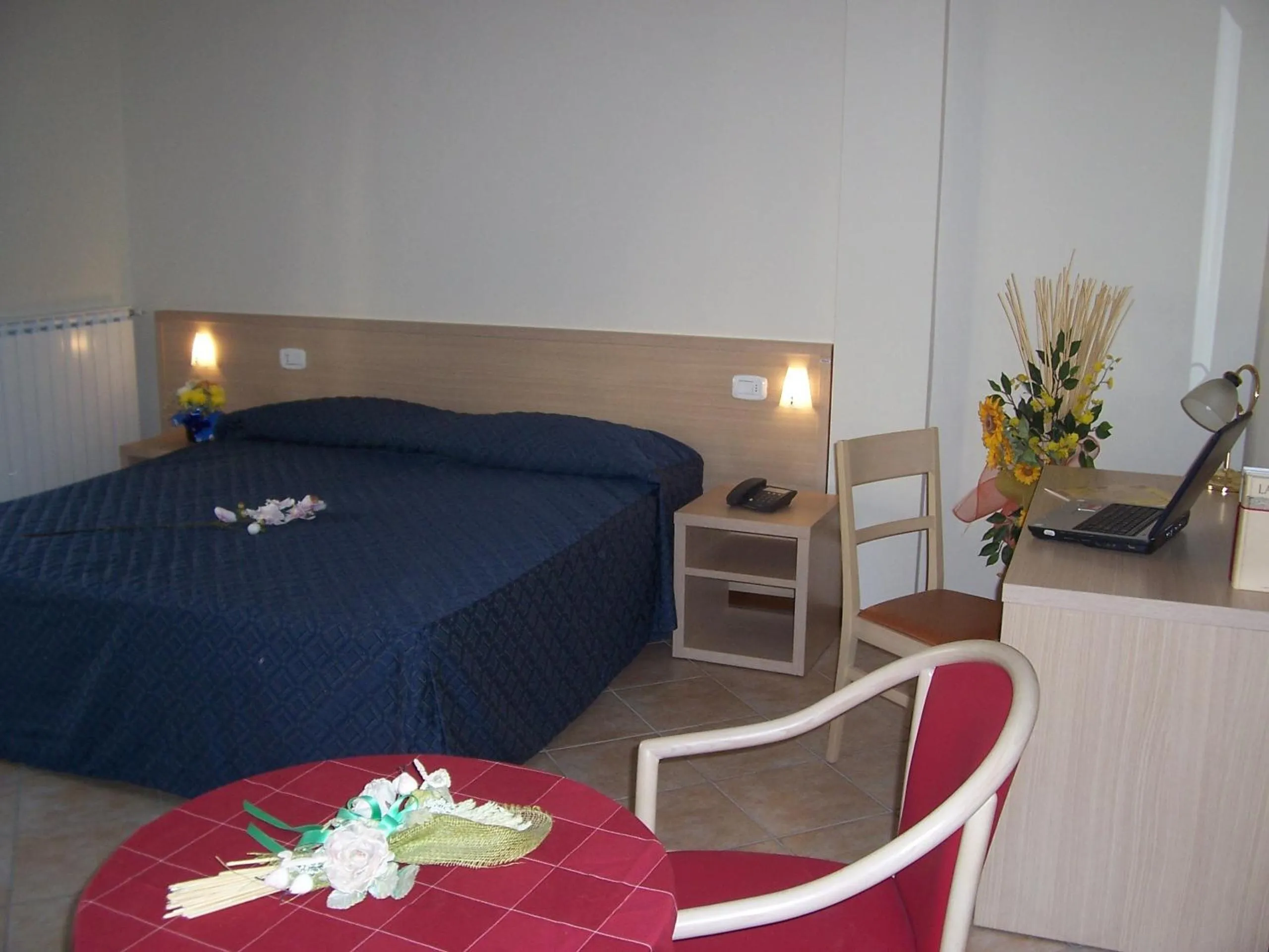 Photo of the whole room, Bed in Hotel Ristorante Tre Leoni