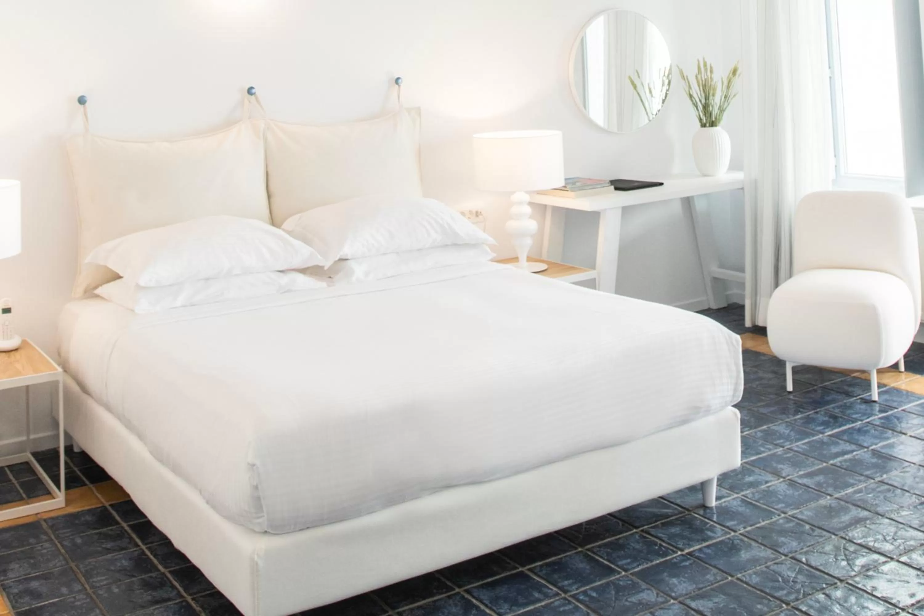 Bed in Lilium Hotel Santorini