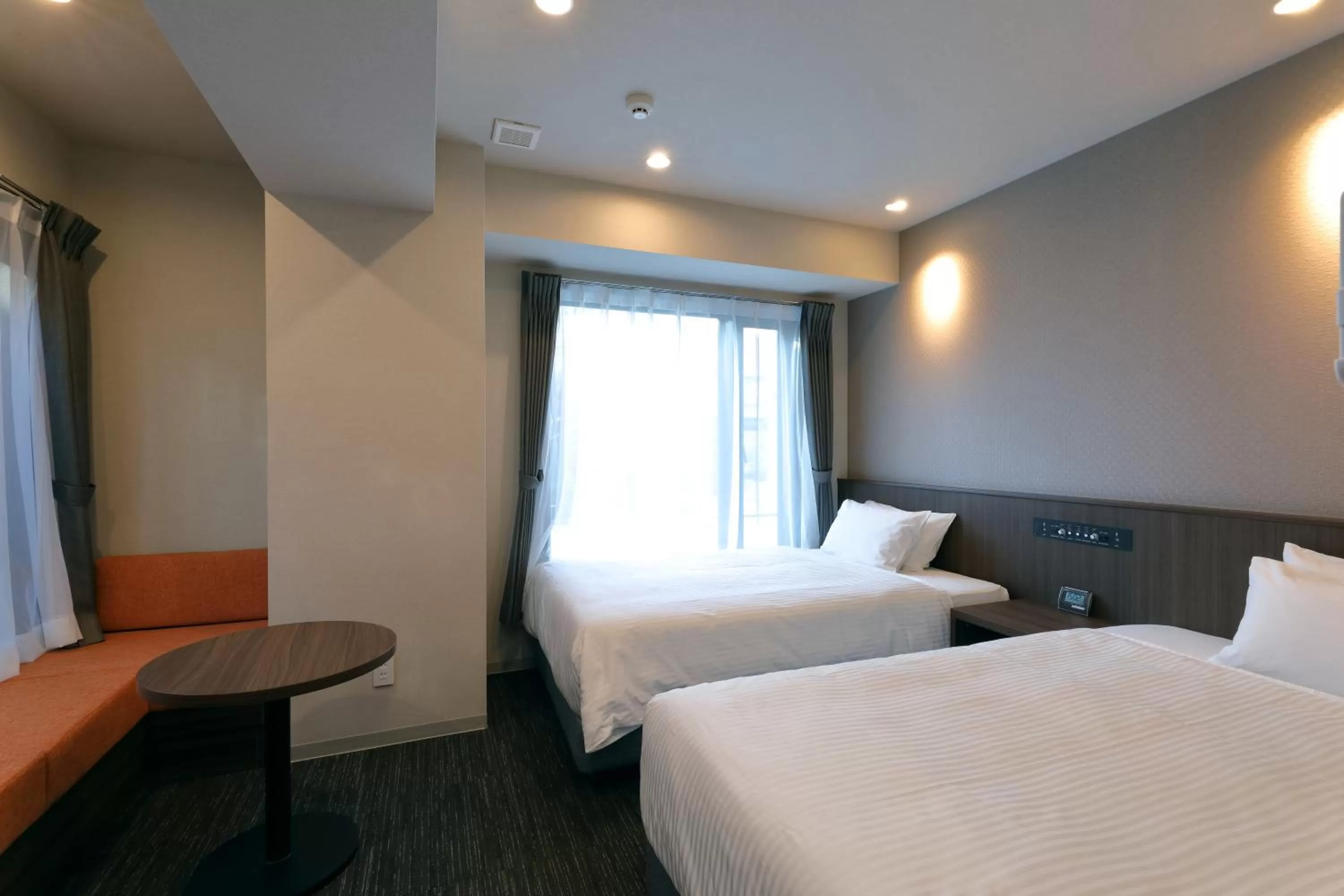 Photo of the whole room, Bed in At Inn Hotel Toyotashi Eki